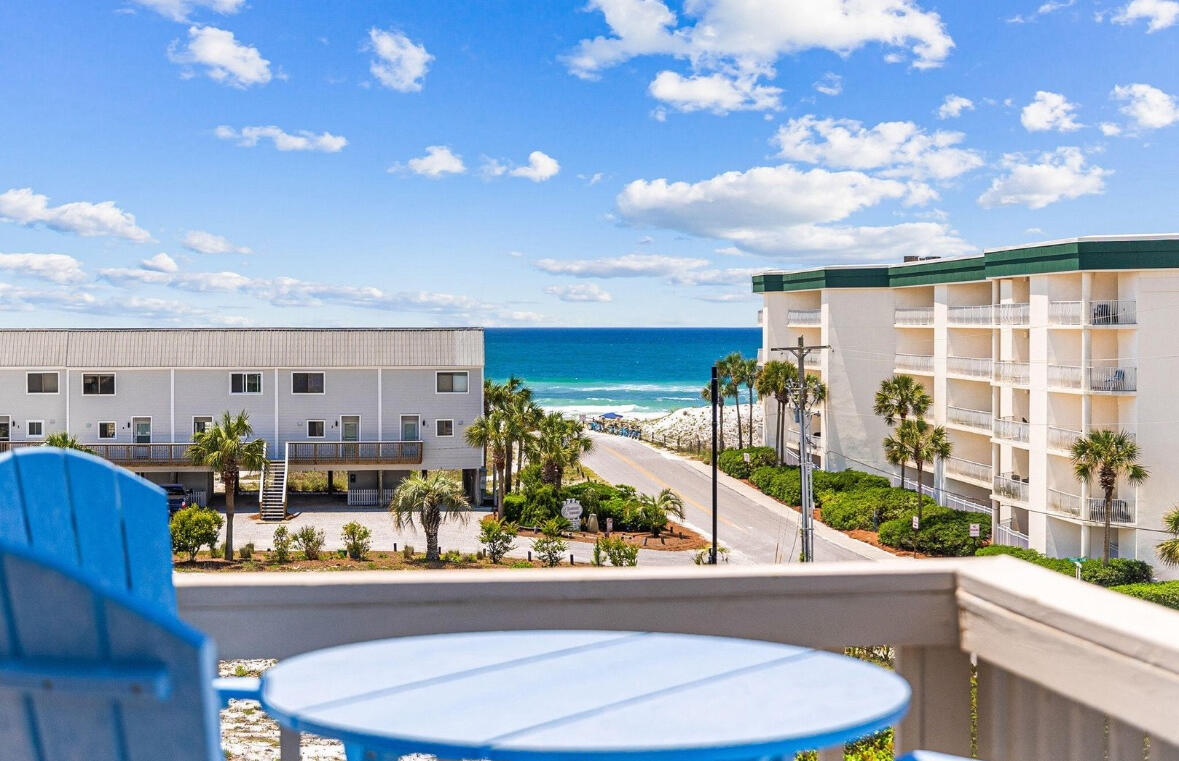 Gulf Views & Top-Floor Living at Beachfront II.  Beach access located 450 feet away.  All of the features that keep renters coming back!  Beautifully manicured landscaping, large community pool area, stunning Gulf views, updated interiors, and a top-floor location--this turnkey-ready unit at Beachfront II has it all! Being the end unit on the top floor, you'll enjoy the best views in the building. Take in direct Gulf vistas from your living room or step onto your private wraparound patio to soak in the breeze and sound of the waves. 
Inside, the unit features numerous upgrades including luxury vinyl plank flooring throughout, shiplap accent walls, vaulted ceilings that enhance the open, airy feel, and a fully updated kitchen and bathroom. You can reach the unit via the stairs at the end of the building leading right to your front door, or use the centrally located elevator for easy access to unit 307A.  Upon entering, you're greeted by abundant natural light pouring through two sliding glass doors. The entryway's shiplap detailing and upgraded LVP floors set a warm coastal tone. The bathroom, immediately to your left, showcases a walk-in shower with custom pebble floor, granite countertops, and a stylish shiplap accent wall. Back in the main living area, you'll find a large storage closet for your beach gear, a pantry/linen closet, and a cozy dining nook complete with an owner's closet. The spacious living area which is bright and open thanks to those vaulted ceilings, flows seamlessly onto the balcony, the perfect spot to relax and enjoy the view. The wraparound balcony provides ample seating so everyone can take in the Gulf scenery together.
Upstairs, the loft offers two queen beds and built-in storage, an efficient and inviting space for guests when it's time to retire for the evening.
What about the Amenities?  Beachfront II offers fantastic community amenities, including a laundry room conveniently located across from the elevator on the ground floor. Outside, a winding pathway leads to lush landscaping and beautifully maintained common areas featuring paver walkways, picnic tables, grills, a covered gazebo, and a sparkling pool and hot tub. Beach access is 450 down the street and can be easily seen from unit 307A. 
Located on the East end of 30A you have easy access to restaurants and boutiques like Old Florida Fish House, Coastside 30A, Buddy's Seafood Market, and so much more.