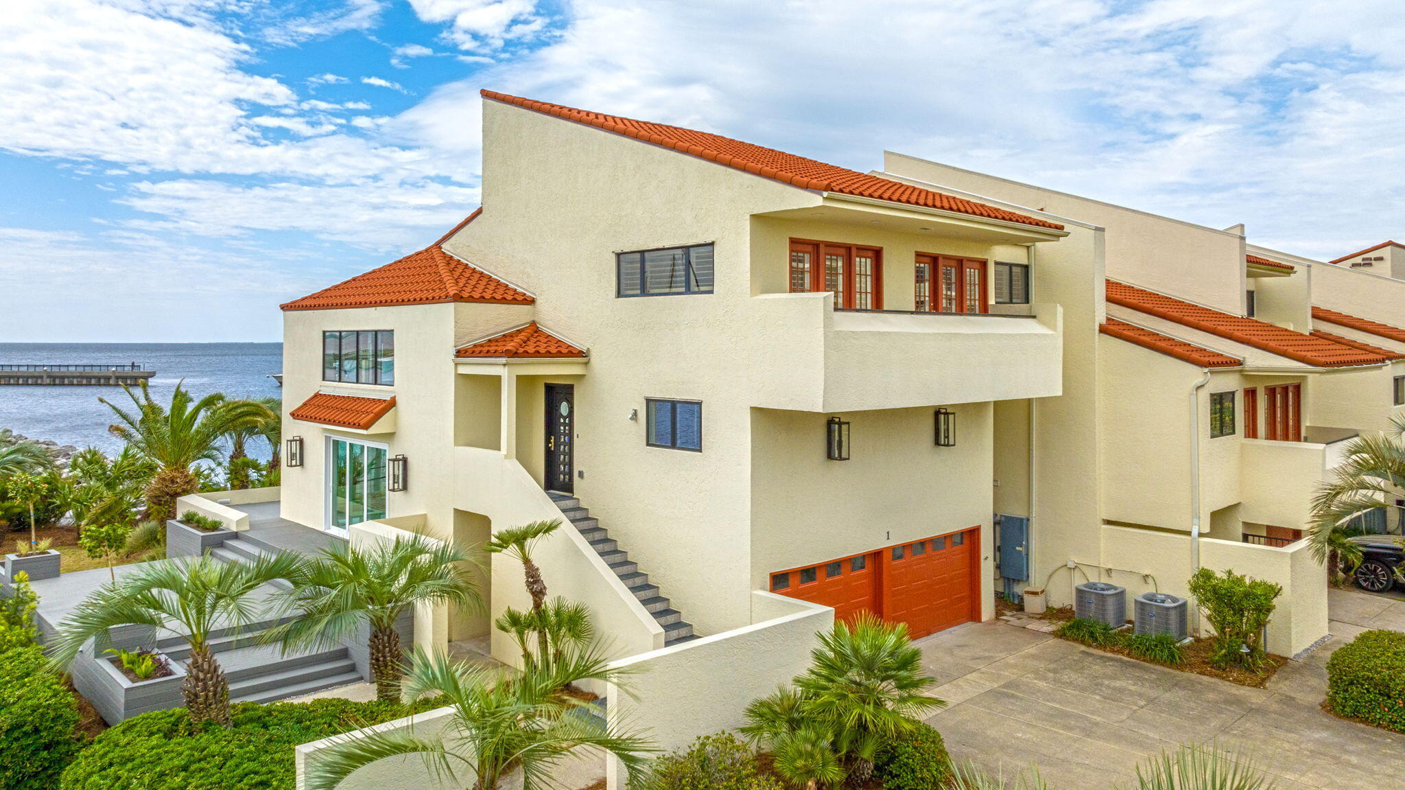 Experience luxury waterfront living with breathtaking panoramic views of Pensacola Bay from this stunning, fully renovated double-unit residence. Perfectly positioned within walking distance of downtown Pensacola and the Blue Wahoos Stadium, this exceptional home offers the ideal blend of elegance, convenience, and coastal charm.
Designed with meticulous attention to detail, the floor plan showcases high-end finishes throughout, including gorgeous quartz countertops, custom cabinets, premium flooring, and countless luxury upgrades.  Don't miss this rare opportunity to own a beautifully reimagined luxury double unit with unparallel views and exceptional craftmanship throughout.