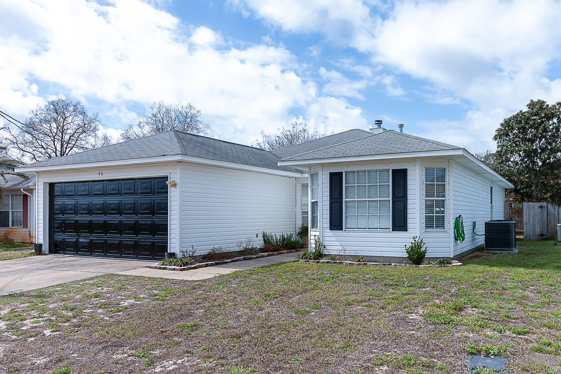 Recent price improvement, very motivated sellers! Roof replacement concession will be made with an acceptable offer!  Do you want to be a short 15-20 minute away from the most beautiful beaches? A place where neighbors wave like it's an 80's sitcom and kids are still seen playing in the street? Look no further than this cute 4 bed, 2 bath home, minutes from Hurlburt Field. This well-kept home features a 2-car garage, screened sunroom, fenced backyard, sprinkler system & more! You'll love the updates, and the updated HVAC and hot water heater in 2023 will be music to your insurance agent's ears!  The kitchen recently got a glow-up and even has a bonus mini fridge, perfect for entertaining. Vaulted ceilings and lots of natural light make it feel spacious and cozy. Great location, charm, and price - gives total small family or second-home vibes! Call today!