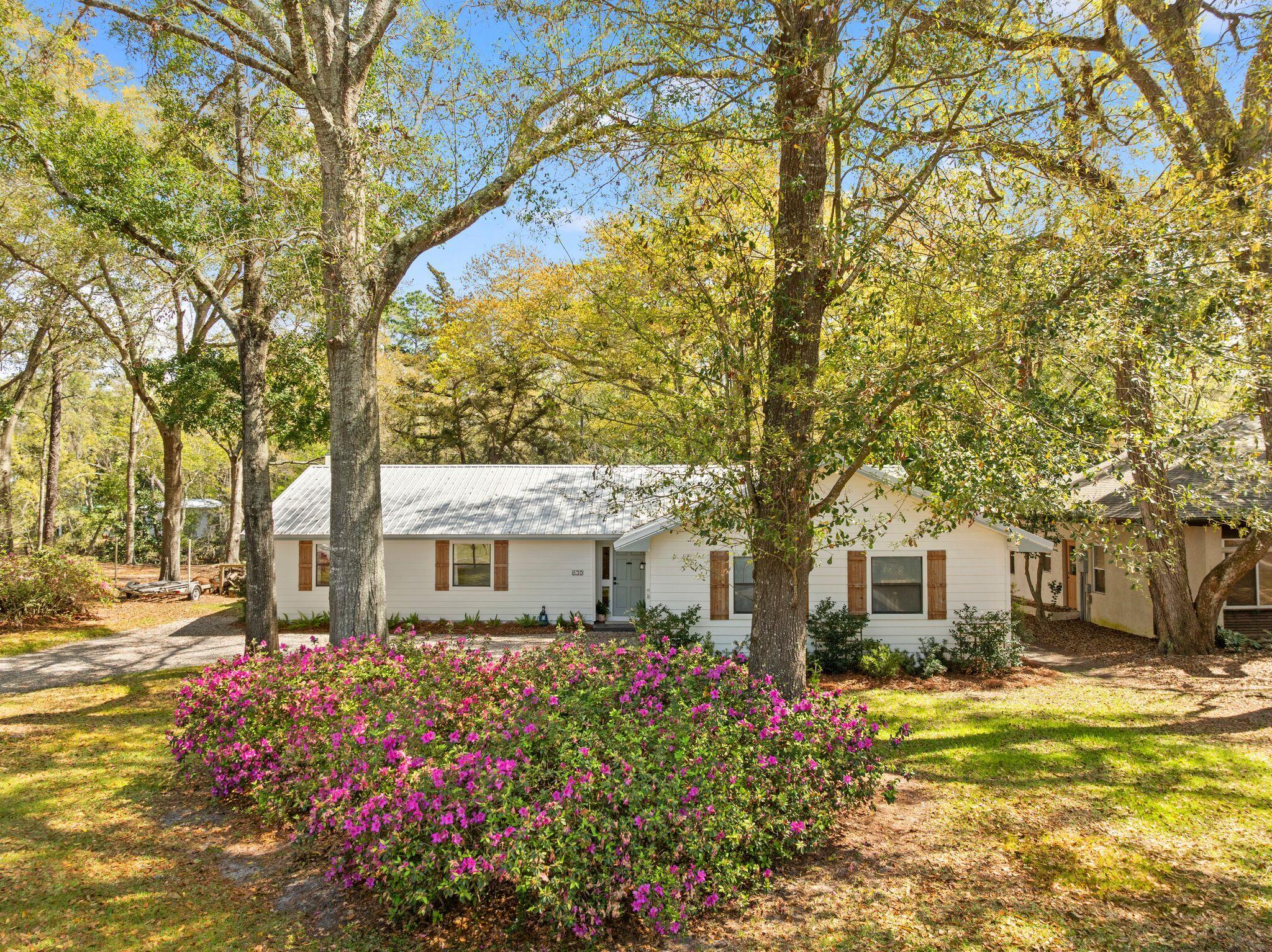 Waterfront living with direct bay access! Located on a canal just feet from Choctawhatchee Bay, this 3-bedroom, 2-bath home offers the perfect opportunity to enjoy the best of coastal living. Situated on a spacious lot with a seawall, a private dock and boat lift, making it easy to get out on the water for boating, fishing, or sunset cruises. This location offers views and access of the bay without the wear & tear! All while being a few miles from Hwy 30A! This fully remodeled one-level home offers bay views from multiple rooms. The open floor plan makes it perfect for relaxing or entertaining the family. Features include vaulted ceilings, LVP flooring throughout the main living areas, GE Cafe white appliances, a breakfast bar, updated bathrooms, enlarged master suite and much more.  Step outside to enjoy the Florida lifestyle with a  waterside boathouse/gazebo, creating an ideal setting for outdoor gatherings while overlooking the canal. With deep-water access providing a short boat ride to Choctawhatchee Bay, this property is a dream for boating enthusiasts.
Whether you're looking for a full-time residence, second home, or waterfront investment, this property offers incredible potential in a prime Santa Rosa Beach location close to the beaches, dining, and shopping of South Walton.