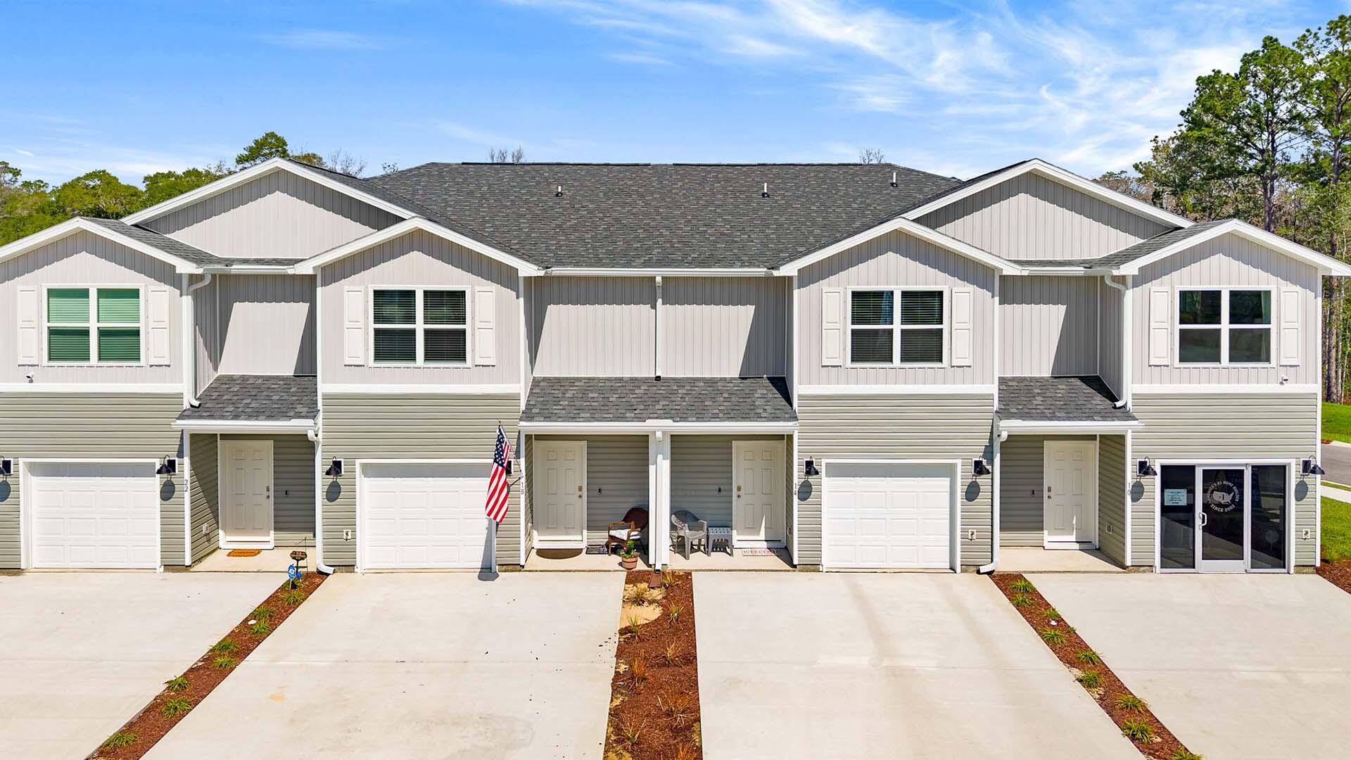 This end unit townhome features a welcoming space that has three bedrooms, two and a half bathrooms, and a convenient single car garage.

 As you enter this townhome you will find a hall leading to an open-concept kitchen, living, and dining area, designed for entertaining and everyday living. Multiple windows illuminate the living area providing natural light. The kitchen serves as the culinary center with its spacious center island and cabinetry for storage as well as a pantry. The kitchen finishes include quartz countertops, white cabinetry, chrome plumbing fixtures, and an appliance package including a smooth top stove, microwave and dishwasher. 

The first floor is the heart of the home, while the privacy of the second level holds all bedrooms, ensuring a quiet retreat. The primary bedroom has a generous closet and a private bath with shower, dual sink vanity, and ample linen storage space. The additional bedrooms share a hall bath with shower tub combo, creating a comfortable space for family or guests. You will also have a laundry area on the second level with space for a full-size washer and dryer.