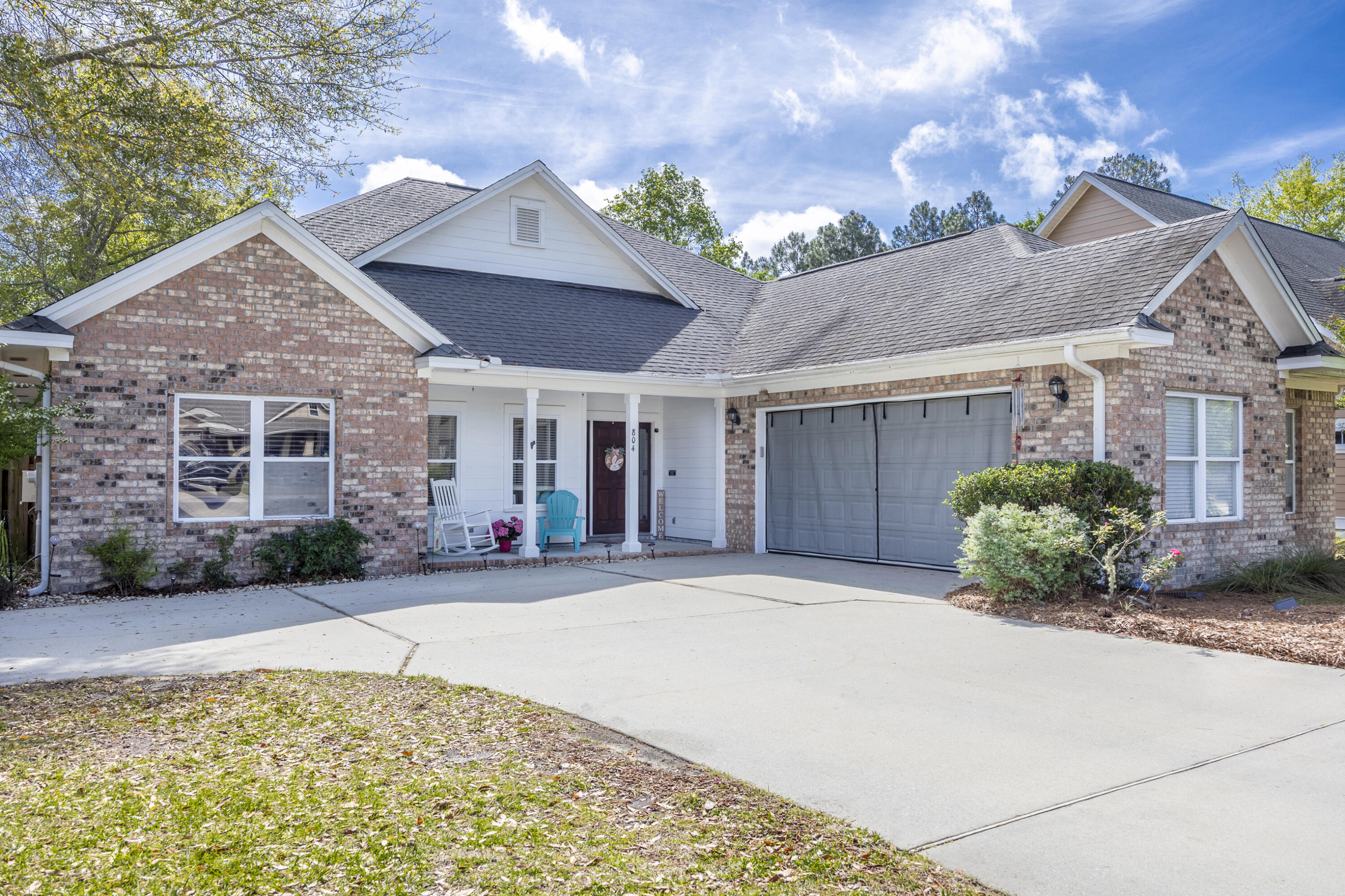 Beautiful custom-built 3BR/2BA home in the highly sought-after Symphony at Hammock Bay! This well-maintained home features an open-concept layout with no carpet, crown molding, and a cozy gas fireplace that anchors the main living space. The kitchen offers granite countertops, bar seating, a large pantry, and abundant natural light.

The spacious primary suite includes a large walk-in closet, dual vanities, and a tiled shower/tub combo. One standout feature is the oversized garage with extra depth for storage, along with a fully fenced backyard backing up to a peaceful preserve--perfect for privacy and outdoor enjoyment.

The home flows seamlessly for entertaining, with a layout that connects the living, dining, and kitchen areas--one of the seller's favorite features. Located in a walkable, community-focused neighborhood with sidewalks, trails, and resort-style amenities including multiple pools, fitness centers, tennis courts, general store, and more. HOA covers access to these amenities plus additional conveniences.

Enjoy the best of Hammock Bay living with easy access to everything you need just minutes from your doorstep!