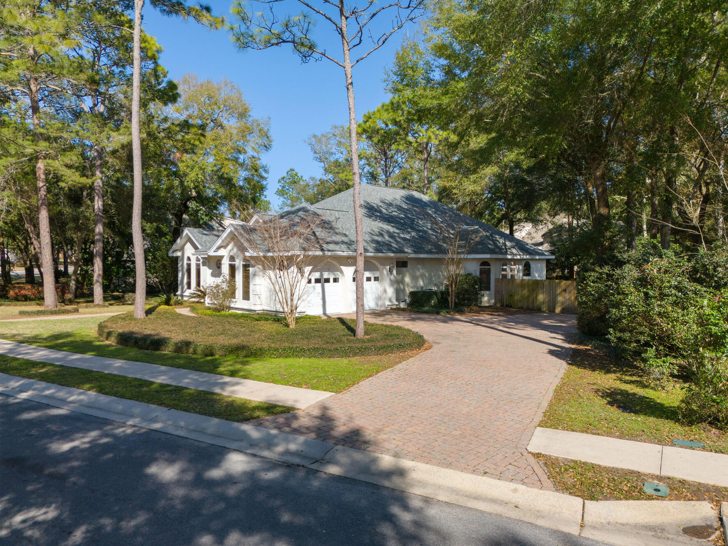 Welcome to 831 Coldwater Creek Circle, an exceptional custom-built retreat in one of Niceville's most coveted communities where timeless craftsmanship meets elevated coastal living.
This beautifully curated 3-bedroom, 3-bath residence offers a rare blend of sophistication, comfort, and flexibility, featuring exquisite craftsman-style woodwork, thoughtfully designed living spaces, and extensive recent upgrades including new flooring, roof, HVAC systems, and water heaters providing both luxury and peace of mind.
Designed with versatility in mind, this distinctive property offers an ideal multi-generational layout, complete with ADU potential for extended family, guests, private office space, or income-producing opportunities. At the heart of the home, a serene courtyard creates the perfect backdrop for entertaining, centered around a charming dip pool that invites relaxed afternoons and unforgettable evenings under the stars.
Located in a highly sought-after sidewalk-lined neighborhood known for its charm and convenience, this home places you moments from exclusive shopping, boutique conveniences, and exceptional five-star dining experiences. And when the coast calls, the sugar-white sands and emerald waters of Destin's world-famous beaches are less than 20 minutes away.
831 Coldwater Creek Circle is more than a home it's a lifestyle designed for those who appreciate quality, flexibility, and refined Florida living.
 This home is in a highly desirable neighborhood with plenty of bike riders and dogwalkers, you'll love it!