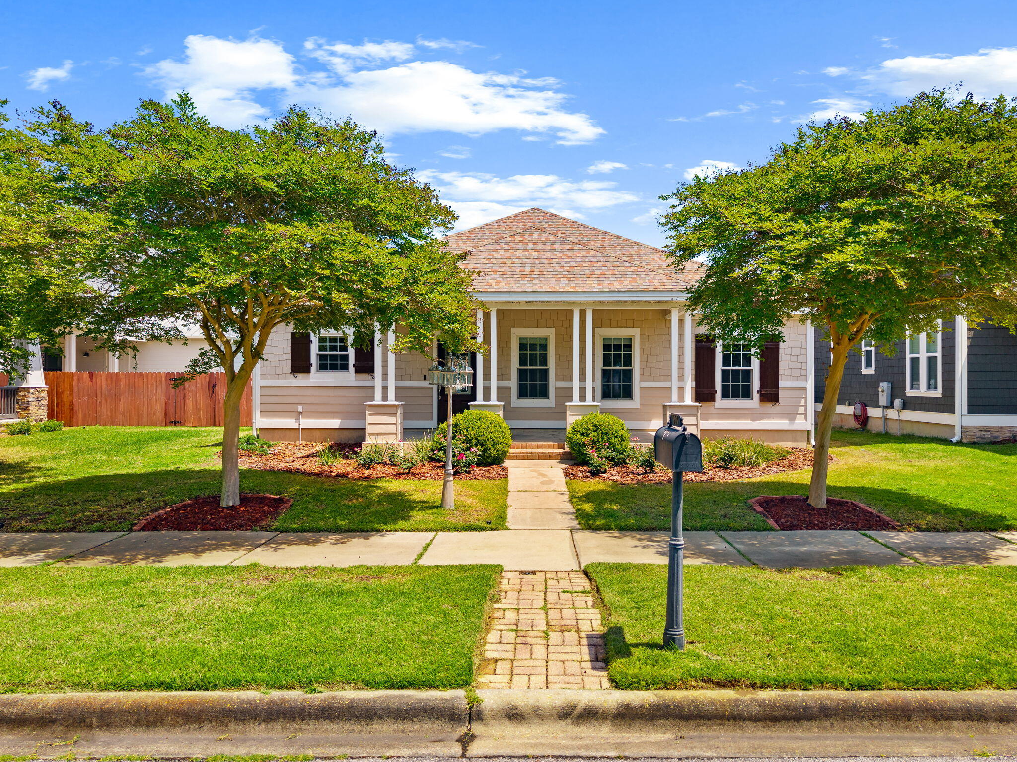 Seller offering $10,000 credit toward rate buy down or closing costs.

Welcome home to 303 Coral Gables Street in Panama City Beach. This 3 bedroom, 2 bathroom single-story Craftsman style home is located in the highly sought-after Tapestry Park community--a charming, family-friendly neighborhood known for tree-lined streets, front porch living, and resort-style amenities. This beautifully maintained home offers comfortable coastal living just minutes from the white-sand beaches of the Gulf of Mexico, making it ideal as a primary residence, second home, or beach-area retreat.

Tapestry Park residents enjoy exceptional neighborhood amenities including a resort-style community pool, clubhouse, basketball and tennis/pickleball courts, and Peacock Park playground, creating a vibrant and welcoming environment for families and neighbors.

Inside, you'll find a bright, open layout designed for easy living and entertaining, with inviting indoor and outdoor spaces perfect for relaxing after a day at the beach. The master suite is a sanctuary - with a custom walk-in closet and an en-suite bath featuring dual vanities with granite countertop, a step in shower, and separate jacuzzi tub. 

The two car garage has shelving to store your seasonal collections and leads into a rear foyer/flex space conveniently next to the large laundry room with washer and dryer included.
 The welcoming front porch adds to the neighborhood's classic coastal charm and encourages connection with the friendly community.

Conveniently located in Panama City Beach near shopping, dining, entertainment, and top local attractions, this home offers the perfect balance of coastal lifestyle, community amenities, and everyday convenience - all just 1/2 mile to the sugar sand and emerald water.
