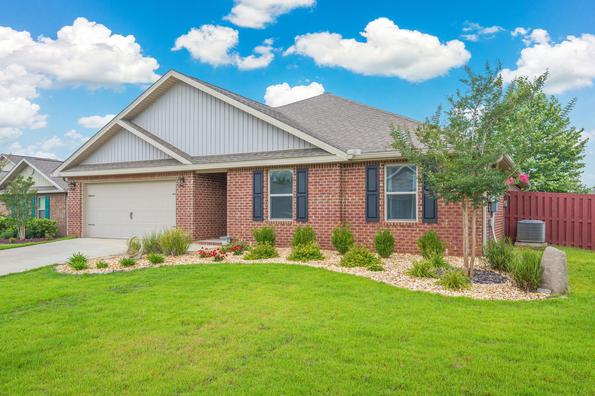 Welcome to Redstone Commons! Conveniently located in the heart of South Crestview, this beautifully maintained 4-bedroom, 2-bath home offers an easy commute to shopping, dining, schools, military bases, and the world-famous Emerald Coast beaches.
This impressive Cairn floor plan features an open-concept design with luxury vinyl plank flooring throughout the main living areas, creating a bright and inviting space perfect for everyday living and entertaining. The spacious kitchen serves as the heart of the home, complete with a large granite island, abundant cabinetry, a generous pantry, and stainless appliances including a stove, microwave, and dishwasher.

The oversized living room flows seamlessly into the dining area and out to the backyard, where you'll find one of the home's standout features--a  extended covered wooden deck. Whether you're grilling with friends, enjoying your morning coffee, or unwinding after a long day, this expansive outdoor living space is designed for year-round enjoyment.

The split-bedroom floor plan provides privacy, while the spacious primary suite offers plenty of room for large furnishings and features a huge walk-in closet along with a well-appointed ensuite bath. Additional upgrades include a fully fenced backyard and an irrigation system to help keep the lawn looking its best.

Bathrooms have been remodeled with all new vanities and granite counter tops.
