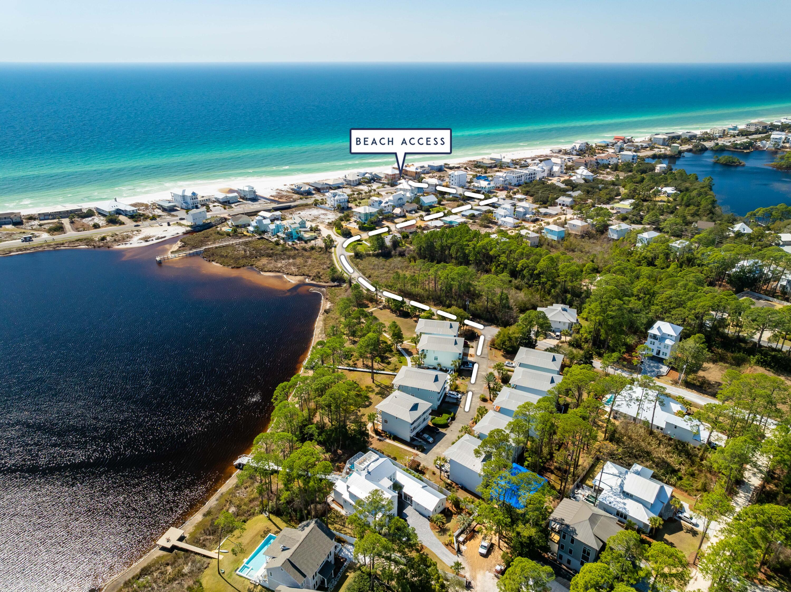 Located in the heart of Santa Rosa Beach, this turnkey townhome offers stunning unobstructed views of the coastal dune lake and community pool with no homes blocking your view. This beautifully designed 4-bedroom, 4-bath townhome features a spacious layout ideal for full-time living, vacationing, or investment potential. Unique to the property are two full kitchens, providing excellent flexibility for large groups, guests, or maximizing rental income. Recent updates include renovated bathrooms, updated kitchens, and refreshed flooring and furniture, adding a modern coastal feel throughout the home. Enjoy open-concept living spaces filled with natural light, multiple outdoor areas to take in the views, and a private garage for added convenience. Located just minutes from the white sand beaches of 30A, dining, shopping, and entertainment, this property combines luxury coastal living with strong short-term rental appeal. A rare opportunity to own a view-focused townhome in one of the Emerald Coast's most desirable locations.