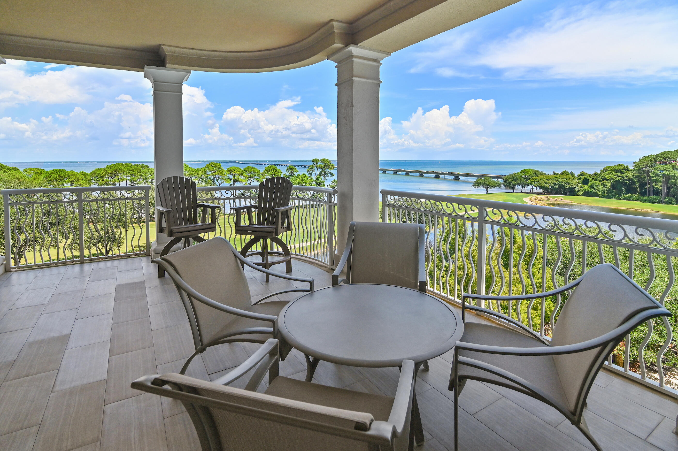Back on the market due to no fault of the seller--offering a renewed opportunity to own one of Destin's most thoughtfully reimagined luxury residences. Welcome to One Water Place at Kelly Plantation--one of Destin's premier luxury condominium communities--where elevated design, exceptional craftsmanship, and panoramic views come together in a residence that feels more like a private coastal retreat than traditional condo living. Completely redesigned in 2021, this 3,008 sq ft residence was transformed to create an open-concept layout that maximizes natural light and captures sweeping views of the bay, golf course, lakes, fountains, pool, and unforgettable sunrise skies.The transformation is immediately apparent. Walls and columns were removed, ceilings were raised, and custom glass doors now frame a sophisticated living environment designed for effortless entertaining and everyday comfort. At the center of the home, the designer kitchen features a dramatic 12' x 14' quartz waterfall island, custom cabinetry, and a full Thermador appliance suite including induction cooktop, wall oven, speed oven/microwave, beverage center, dishwasher, and ice maker.
Luxury details continue throughout with a custom wet bar, two-sided linear gas fireplace, Lutron lighting system, programmable Hunter Douglas shades, California Closets, and beautifully appointed marble bathrooms. The primary suite offers a peaceful escape with spa-inspired finishes, a steam shower, and tranquil water views that  make every morning feel elevated.
Outdoor living was designed with the same attention to detail. Both balconies have been upgraded with modern tile flooring, and one has been transformed into an outdoor entertaining space featuring a Blaze gas grill and refrigerator drawers--ideal for dining outdoors, hosting friends, or enjoying the coastal breeze and changing views throughout the day.
Located within the gated Kelly Plantation community, this residence also includes an oversized private storage room measuring approximately 12' x 14' on the garage level--a rare luxury for condominium living. Opportunities to own a fully renovated luxury condo in Destin with this scale, level of finish, open design, and panoramic views are uncommon.
For those looking for a lock-and-leave coastal residence without compromising on space, design, or lifestyle--this may be the one worth seeing in person.