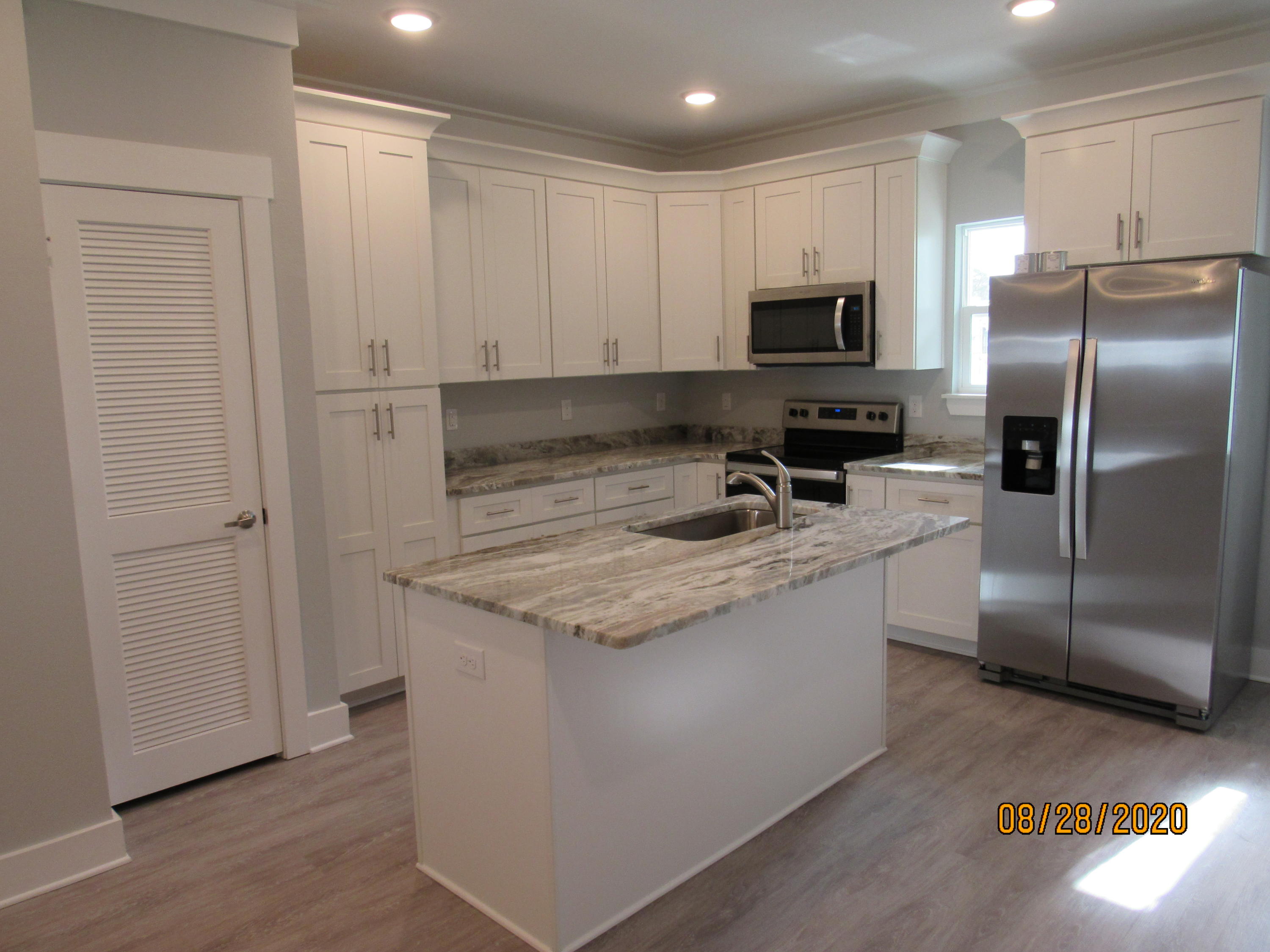 Welcome to this charming 2-bedroom, 2.5-bath townhouse offering comfort, convenience, and access to a community pool. Ideally situated directly across from an elementary school and just minutes from Publix, shopping, dining, and everyday conveniences, this home also provides an easy commute to the beautiful sugar-white sand beaches and emerald waters of 30A and South Walton.

Step inside to discover a bright and inviting interior featuring fresh neutral paint and durable flooring throughout with no carpet, creating a clean and modern living space. The open-concept main level offers a spacious living room with a cozy nook that can be used as a reading area, workspace, or additional seating space. The well-appointed eat-in kitchen is designed for both functionality and style, featuring a breakfast bar, sleek countertops, ample cabinetry, stainless steel appliances including a flat-top range, and an attractive backsplash. A convenient half bathroom and a screened-in back porch provide additional comfort and outdoor enjoyment.

Upstairs, you'll find two generously sized bedrooms, each offering its own private en-suite bathroom, making this layout ideal for privacy and flexibility. The laundry area is conveniently located on the second floor, and a washer and dryer are included for your convenience. Ample storage space can be found throughout the home to accommodate your everyday needs.

For added value and ease of living, pool care, lawn maintenance, and garbage service are all included in the rent. Pets may be considered on a case-by-case basis with prior owner approval and a non-refundable pet fee. Smoking is not permitted.

This well-maintained townhouse combines modern comforts, a convenient location, and a desirable coastal lifestyle. Contact us today to schedule your private showing and see all that this wonderful home has to offer.