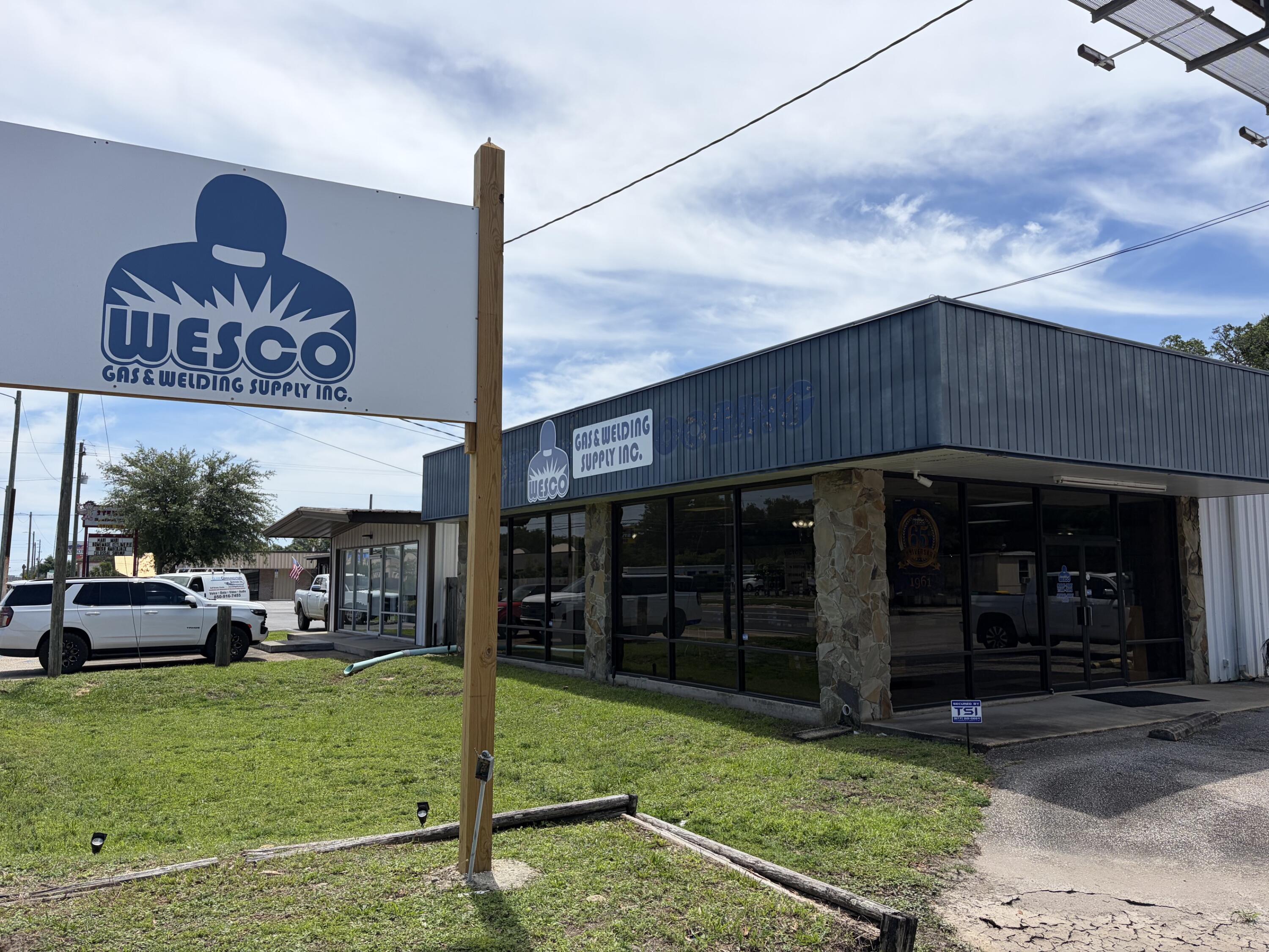 Freestanding, Income producing asset occupied by Wesco Gas.  They are a successful regional tenant servicing Propane Gas needs for the area.  They have 12 total stores under management in the Southeast.  Highly visible location along Racetrack Road in Fort Walton Beach, FL.  This freestanding building has great curb appeal and is very functional for many different business types.  Glass storefront with open showroom, new LVP flooring, several offices, kitchen/ break area, 2 restrooms and rear warehouse with two roll up doors.  Nice amount of parking to allow for large trucks & trailers.  Fenced in rear lot for outdoor storage.  Building make up is roughly 2,500 SF showroom / office and 3,000 SF warehouse.
