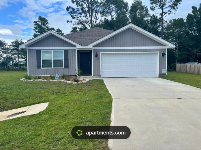 **SHORT SALE - PRICED AGRESSIVELY TO SELL - PICTURES COMING SOON** Don't miss this opportunity to own this 4-bedroom, 2-bath home featuring the sought-after Freeport floor plan with an open-concept layout that's great for everyday living and entertaining. The kitchen offers a large island, pantry, stainless steel appliances, a smooth-top range, and a built-in microwave. The primary suite features a private bath and a spacious walk-in closet, while the additional bedrooms provide plenty of space for family, guests, or a home office. Wood-look flooring runs throughout the main living areas, with carpet in the bedrooms for added comfort. The home also includes Smart Home technology for added convenience. Conveniently located in the growing North Crestview area with easy access to Fort Walton Beach, Destin, shopping, dining, and nearby golf courses. This home has plenty of potential and is ready for its next owner!