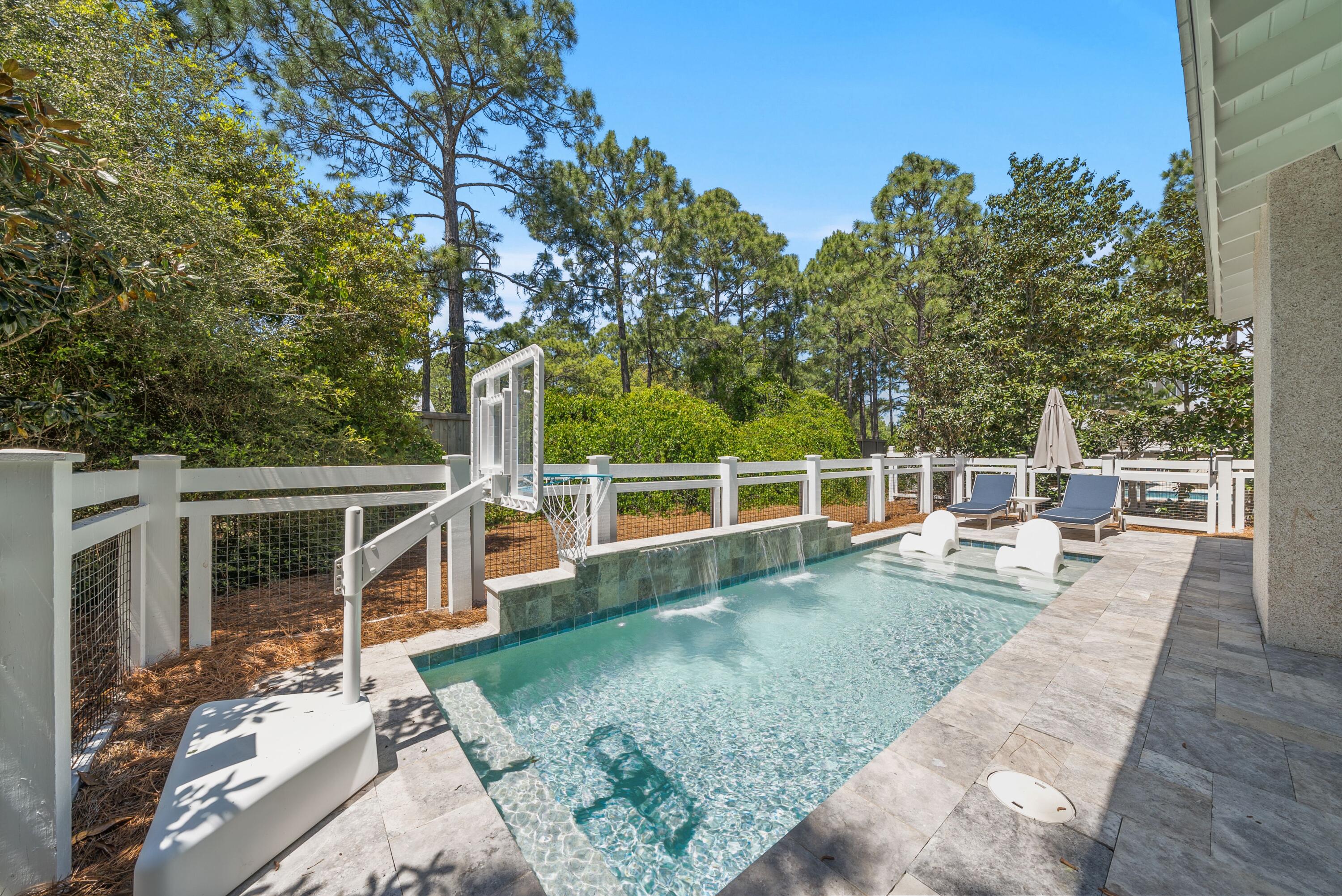 Set within WaterColor's Crossings District, this one-owner Romair-built residence is one of the builder's most sought-after floor plans enhanced with a private pool and the kind of indoor-outdoor living that defines life along 30A. Very rarely rented and beautifully maintained, the home spans approximately 3,024 square feet with four bedrooms, a dedicated bunk room, four full baths and a powder bath, offering a layout that feels equally suited to full-time living, a second-home escape or a strong luxury investment.

The interiors are designed for both ease and style, with generous gathering spaces, a full-size laundry room with sink and a well-appointed kitchen anchored by Sub-Zero and Wolf appliances. A wet bar with wine fridge adds another layer of convenience for entertaining, while the versatility of the floor plan allows owners and guests to spread out comfortably.

Outside, the home truly comes into its own. A private pool with sun shelf sets the tone for long afternoons at home, while four covered patios and porches create a series of inviting spaces for quiet mornings, casual dinners and game-day gatherings. The screened side porch with TV is made for coffee and SEC football, and the expanded rear porch with outdoor fireplace extends the living experience well beyond the interior walls.

Ownership also opens the door to WaterColor's celebrated amenity package, including the recently remodeled Beach Club, Camp WaterColor, Dragonfly Pool, Frog Pool and neighborhood pools throughout the community. WaterColor also borders Western Lake, where owners can enjoy canoe and paddleboard rentals from the BoatHouse, along with an extensive network of bike paths and nature trails across the 499-acre community. Tennis and pickleball facilities are currently undergoing a full renovation, and the seasonal tram system offers convenient transportation throughout the neighborhood.

Just beyond the gates, owners are moments from acclaimed dining, boutique shopping, scenic bike paths and easy access to Highway 98 for trips to Destin, Panama City Beach and Northwest Florida Beaches International Airport. This is a thoughtfully designed WaterColor home with privacy, flexibility and the sort of porch-and-pool lifestyle buyers ask for again and again