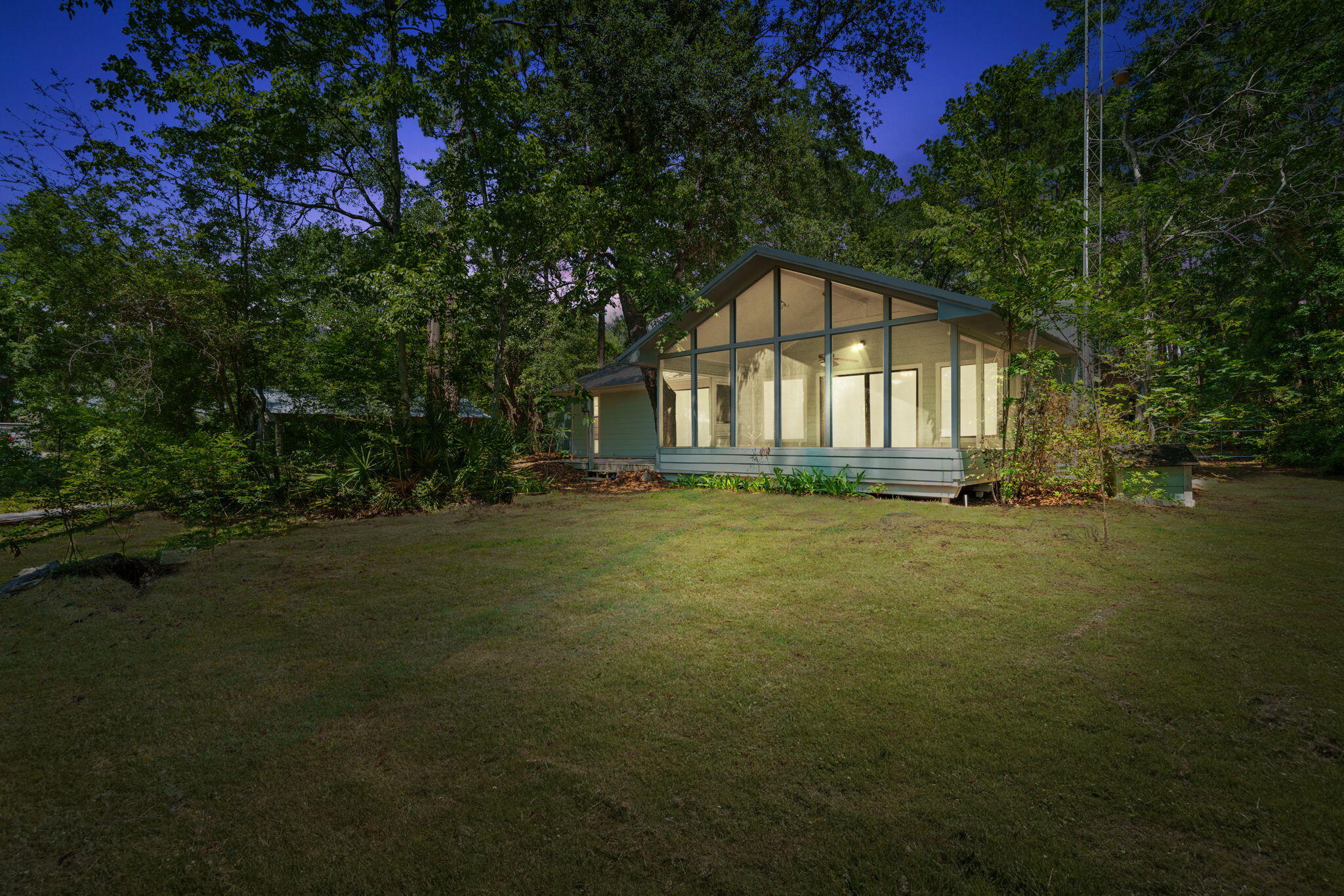 MOTIVATED SELLER - BRING ALL OFFERS! Enjoy waterfront living on beautiful Mallet Bayou with approximately 100 feet of water frontage and direct access to boating, fishing, kayaking, Choctawhatchee Bay, and the Intracoastal Waterway. This unique property features a private dock with four slips and a boat lift rated for up to 3,000 lbs.

The home offers a spacious screened porch overlooking the water, a wood-burning fireplace, double-pane windows, foam attic insulation, durable Hardie board siding, and a new metal roof installed in 2024. In addition to the attached two-car garage, the property includes a detached garage/workshop, RV pole barn, carport, greenhouse, and mower shed, providing ample storage and workspace.

With no HOA and unrestricted use, this property offers incredible flexibility for boaters, hobbyists, RV owners, and those seeking room to spread out. Conveniently located near Freeport's shopping, dining, marinas, schools, and just a short drive to the beaches of South Walton.

Motivated seller says bring all offers! This is a rare opportunity to own a well-equipped waterfront property with endless possibilities on Mallet Bayou.
