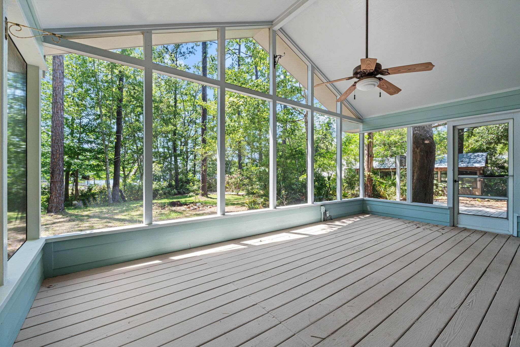 MOTIVATED SELLER - BRING ALL OFFERS! Enjoy waterfront living on beautiful Mallet Bayou with approximately 100 feet of water frontage and direct access to boating, fishing, kayaking, Choctawhatchee Bay, and the Intracoastal Waterway. This unique property features a private dock with four slips and a boat lift rated for up to 3,000 lbs.

The home offers a spacious screened porch overlooking the water, a wood-burning fireplace, double-pane windows, foam attic insulation, durable Hardie board siding, and a new metal roof installed in 2024. In addition to the attached two-car garage, the property includes a detached garage/workshop, RV pole barn, carport, greenhouse, and mower shed, providing ample storage and workspace.

With no HOA and unrestricted use, this property offers incredible flexibility for boaters, hobbyists, RV owners, and those seeking room to spread out. Conveniently located near Freeport's shopping, dining, marinas, schools, and just a short drive to the beaches of South Walton.

Motivated seller says bring all offers! This is a rare opportunity to own a well-equipped waterfront property with endless possibilities on Mallet Bayou.