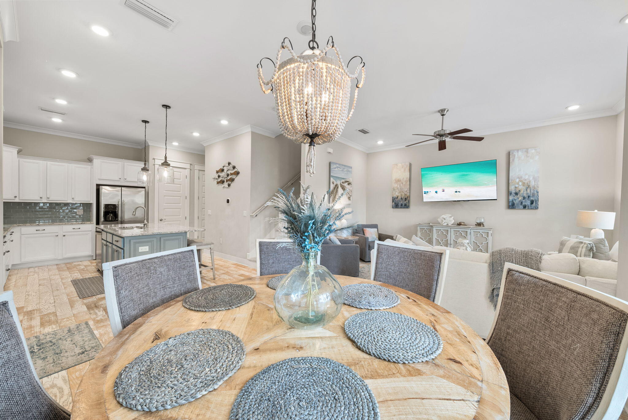 Turn-key, fully furnished, and GOLF CART INCLUDED--this beautifully appointed 3-bedroom, 2.5-bath Prominence B townhome is an ideal investment property, second home, or the perfect combination of both. Perfectly positioned in the heart of Prominence, this townhome is just a short stroll to the resort-style pool and community amenities. Inside, you'll find a professionally designed coastal interior featuring light hardwood floors, quartz countertops, custom cabinetry, glass subway tile backsplash, designer lighting, and upscale furnishings in calming natural and blue-green tones. Details have been thoughtfully curated, from upgraded plumbing fixtures and window treatments to the tankless Rinnai water heater, 10' ceilings, and 8' doors, creating a bright and refined gathering space.  The attached two-car garage provides ample parking and storage, adding convenience and value. Located in the heart of Prominence along Scenic 30A, this home offers walkable access to the community's vibrant town center, The Big Chill (formerly The Hub), featuring restaurants, shopping, outdoor movies, concerts, and events. Ideally situated between Seagrove and Alys Beach and neighboring WaterSound, Prominence blends relaxed coastal living with energy and connection. This turn-key townhome delivers the very best of the 30A lifestyle!