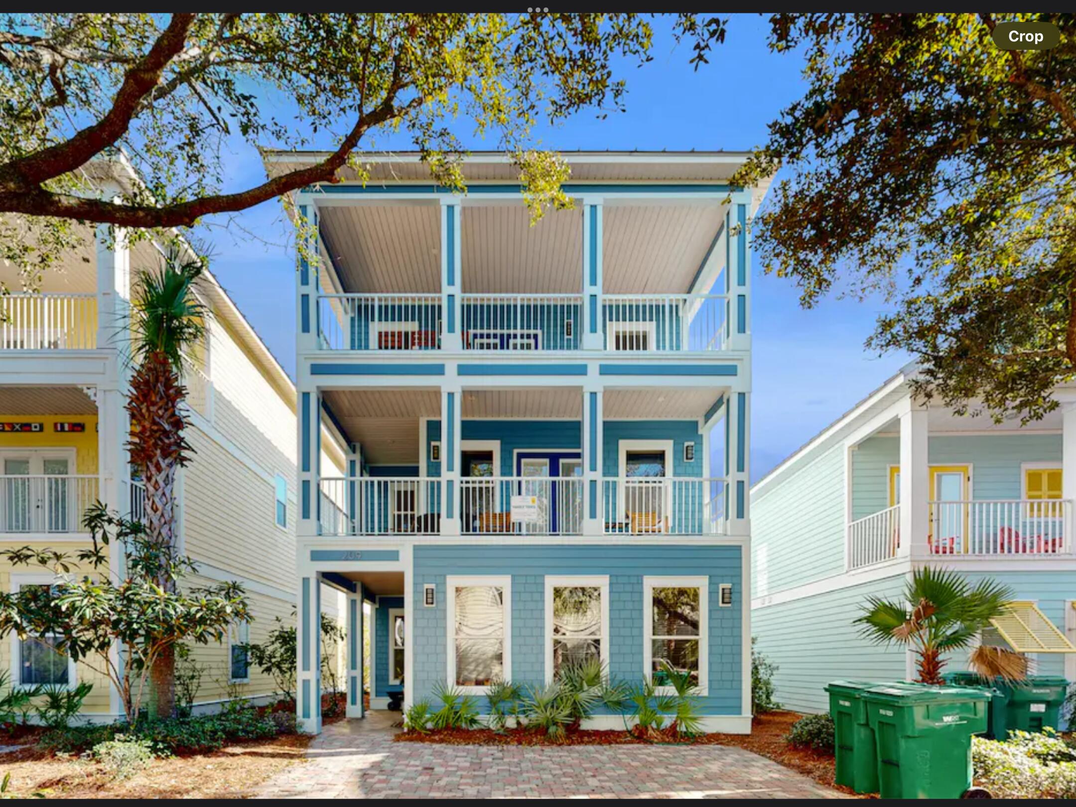 This premier gated community is a standout destination in Destin, renowned for its exceptional rental potential and resort-style amenities. Perfectly positioned directly across from Destin Commons and just moments from shopping, dining, and entertainment, this location offers both convenience and a true coastal lifestyle.

This impressive three-story, 5-bedroom, 4-bath retreat offers 2,769 square feet of spacious, thoughtfully designed living. Fully furnished, turn-key, and rental-ready, the home comfortably accommodates large groups with an open-concept main living area, two separate living spaces, and two master suites for added flexibility and privacy. The expansive third-floor sitting area, complete with private balcony access, provides the perfect secondary gathering space for guests. Enjoy serene views from multiple large covered porches--ideal for relaxing evenings and taking in the sunset. Located just three doors down from the pool, this home offers effortless access to one of the most impressive pool complexes in Destin, featuring a beach-entry design, waterfalls, tropical island, hot tub, and tiki bar/grill.

Villages of Crystal Beach also offers unique amenities including a seasonally heated pool for spring break and holidays, as well as an air-conditioned shuttle service that conveniently transports owners and guests to the beach during peak seasons.

Whether you're seeking a high-performing investment property or a personal beach retreat, this home checks all the boxes in one of Destin's most desirable communities.