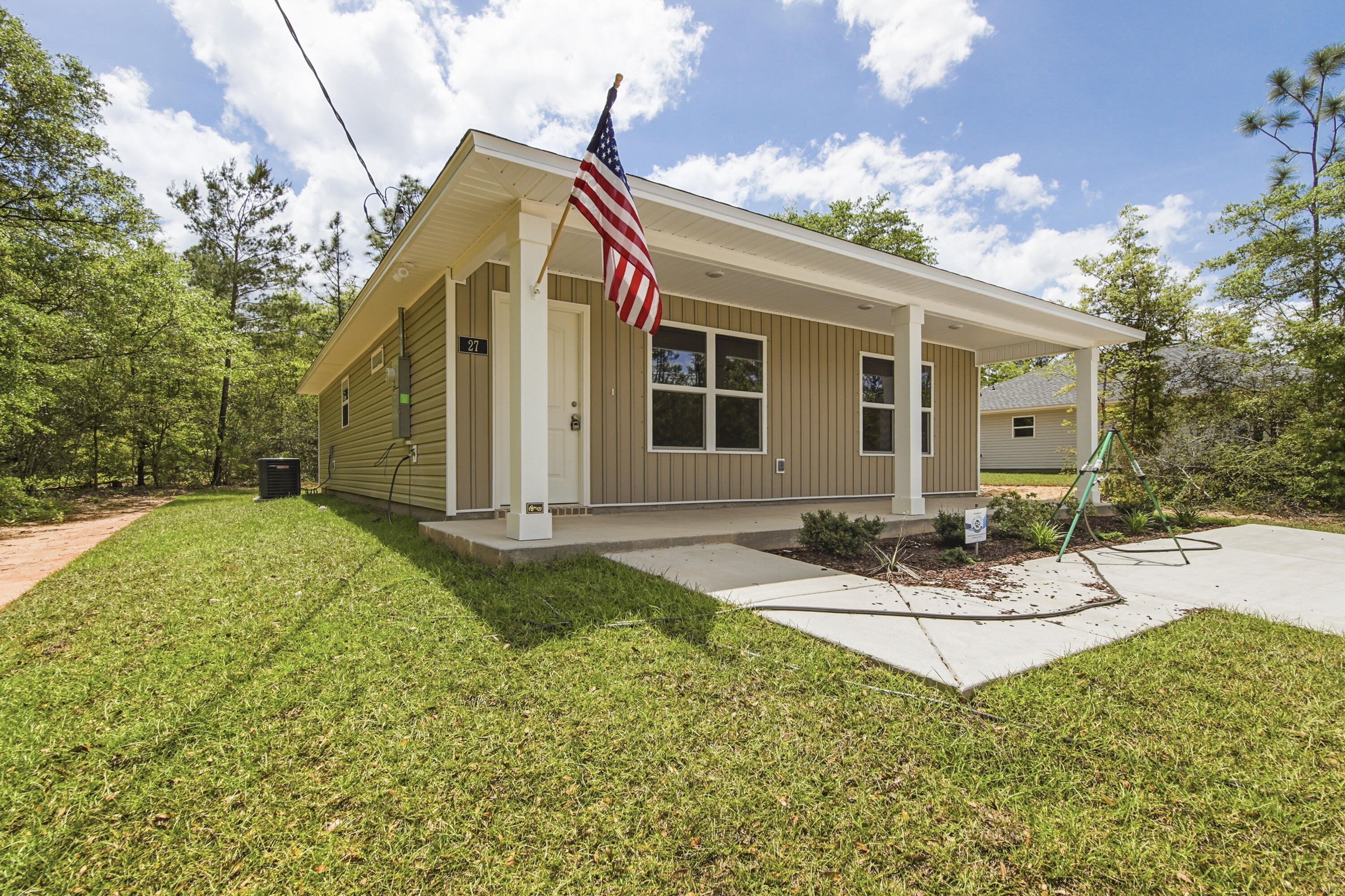 Fresh, simple, and easy to love. This newly built home by Flynn Built welcomes you with an expansive front porch , offering 2 beds and 2 baths with a light, open layout that feels comfortable and livable. Inside, you'll find durable LVP flooring throughout, granite countertops, stainless appliances and a bright, airy feel that makes the space live larger than expected. The exterior features low-maintenance vinyl siding, making upkeep. Also included is a one-year builder warranty for added peace of mind. Plus, with a full-price offer, buyers receive $6,000 toward closing costs, making this a super option for first-time buyers, those downsizing, or anyone looking for a clean, move-in ready start.