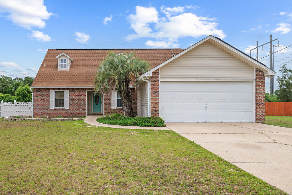 Welcome to this beautiful 4-bedroom, 2-bathroom home located in the desirable subdivision! Step inside to find stunning wood and tile flooring and a vaulted entry ceiling that creates an open, inviting feel. 
The spacious kitchen provides plenty of counter space and cabinetry, making meal prep easy and enjoyable. The large living area and separate dining room offer the perfect setup for entertaining guests or relaxing after a long day. 

Outside, unwind on the back deck, gather around the firepit, and enjoy the privacy of your fenced backyard. Solar panels add energy efficiency and long-term savings. 

Conveniently located near Eglin AFB, Duke Field, Hurlburt Field, shopping, hospitals, and more; this home truly has it all. The home is currently occupied and requires minimum 24 hr notice.