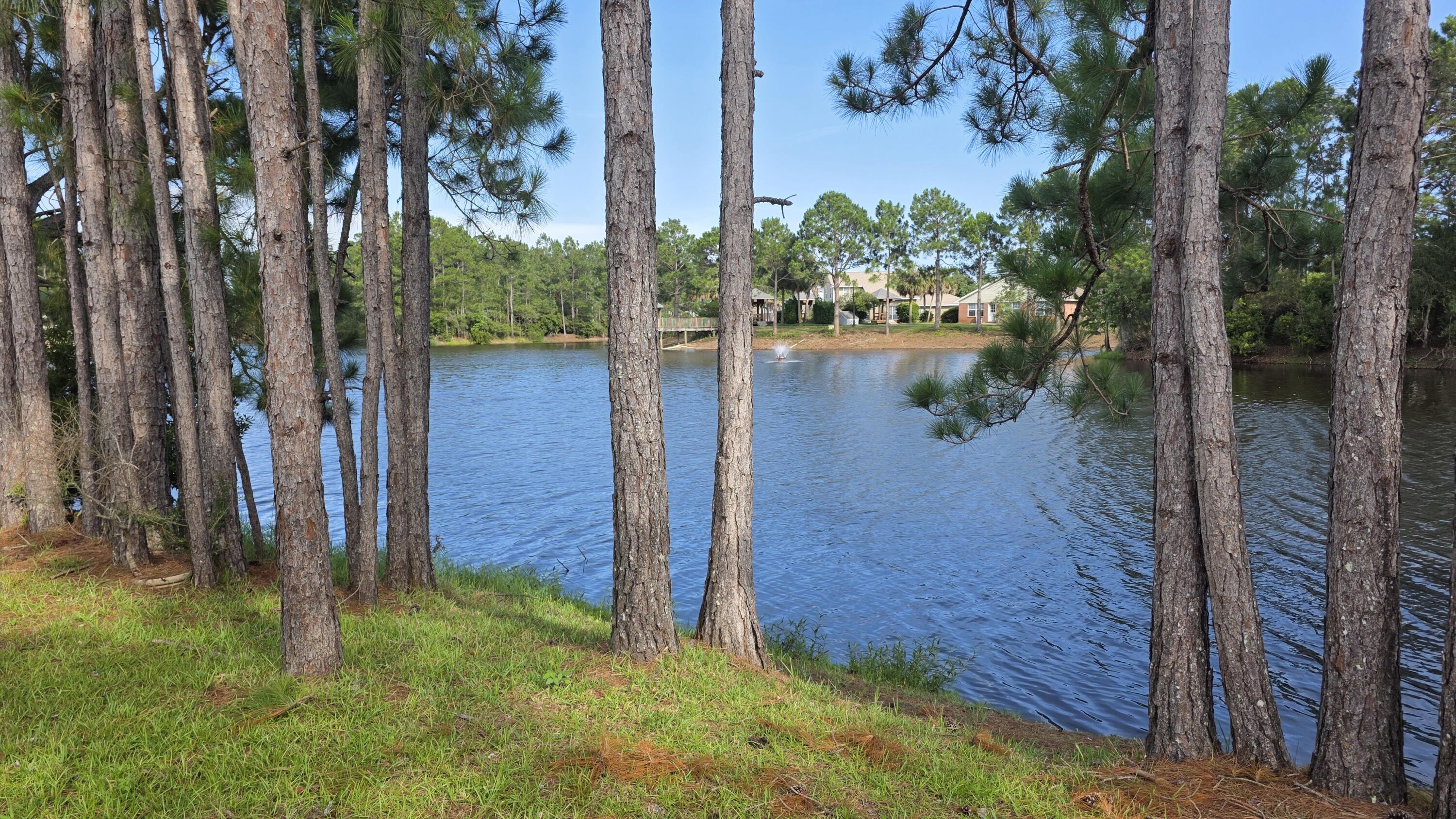 Waterfront Living in Navarre! This spacious home is move-in ready, with fresh interior paint, quartz countertops in the kitchen, and stainless appliances. All brick, with 3 BR, office, formal dining, and a large Florida room to enjoy the view from. The majority of the home features mahogany plank porcelain tile or honey oak Mohawk PureTech Plus flooring. Samsung washer/dryer with storage pedestals convey.
Roof 2024, Water Heater 2022, HVAC 2020 (4 Ton Heat Pump).
Prime location, nestled in a quiet, well-established community with NO HOA, just minutes from the pristine white sands of Navarre Beach, top-rated schools, and plenty of dining and shopping options. Less than 15 min commute to Hurlburt.
