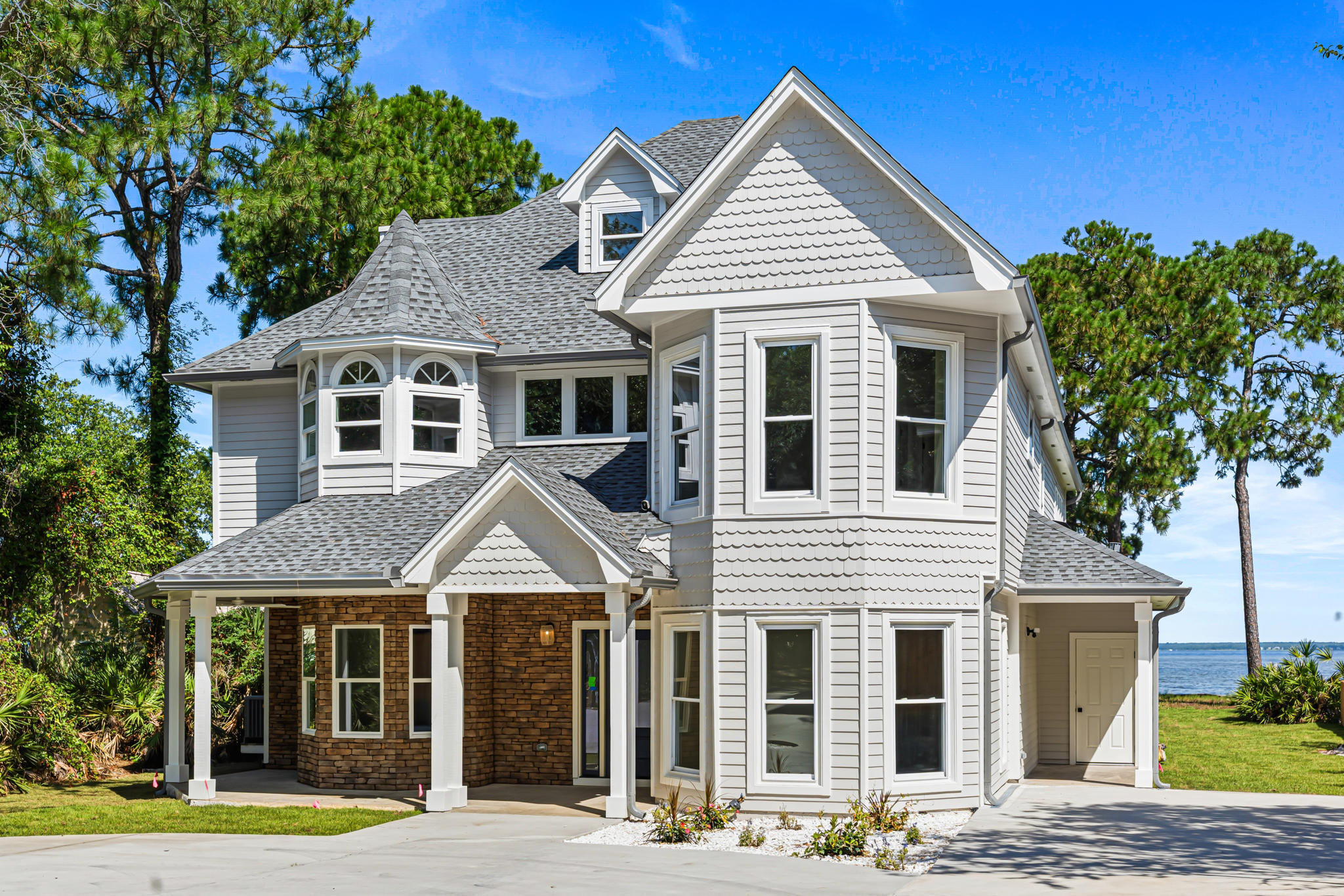 Welcome to one of Destin's most unique waterfront estates. Situated on nearly an acre with approximately 88 feet of frontage on Choctawhatchee Bay, this exceptional property offers a rare combination of privacy, space, and breathtaking views.

Currently undergoing a complete top-to-bottom renovation, with completion expected within the next 30 days, this 6-bedroom, 5-bath waterfront estate is being transformed into a stunning coastal retreat. Surrounded by mature trees and accessed by a private gated driveway, the property feels like a secluded oasis while remaining just minutes from Destin's beaches, dining, shopping, and entertainment.

Offering 4,859 square feet of living space, the home features a waterfront primary suite with a private balcony overlooking the bay, five additional spacious bedrooms, and multiple indoor and outdoor living areas designed for entertaining and enjoying the waterfront lifestyle.

Step outside to an expansive two-level deck, private dock, and approximately 88 feet of bay frontage. Spend your days boating to Crab Island, enjoying waterfront dining at Destin Harbor, fishing from your dock, or simply taking in spectacular sunset views from your own backyard.

A detached three-car garage provides ample space for vehicles, golf carts, and water toys, while the nearly one-acre homesite offers a level of privacy rarely found in Destin. With no HOA, you'll enjoy the freedom and flexibility that make properties like this so desirable.