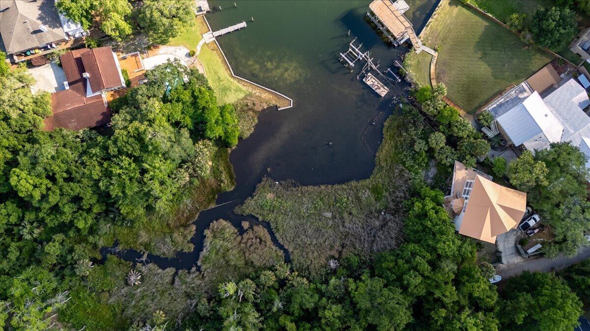 Rare opportunity to own a waterfront homesite located along the southern boundary of Petit Court, and along the Shores of Lake Como, connecting to the waters of the Choctawhatchee Bay. 

This sale includes a unique opportunity to purchase lots 2-5. Lot 2 is listed separately due to the deed, but all four lots must be purchased together. 
Part of lot 3 is wetlands and all of lots 4 & 5 are designated wetlands. See additional documents. 
These additional lots provide added privacy, giving you nearly one acre and approx. 460 feet of waterfront property with natural beauty and convenient access to the bay. 

Buyers are strongly encouraged to conduct their own due diligence regarding wetlands, permitting, building requirements, and intended use of the property. See your agent for a list of resources.