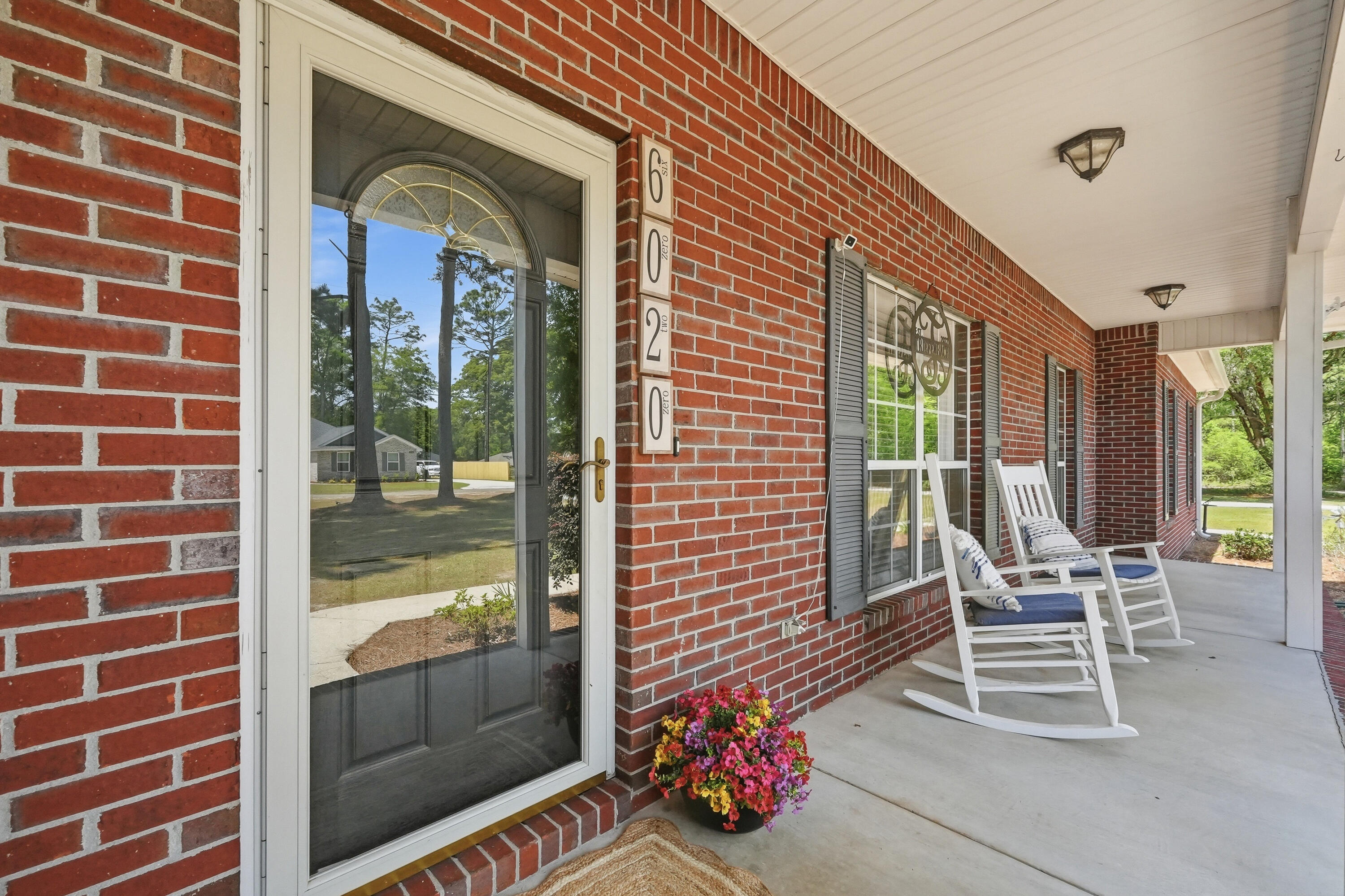 Tucked down a private drive on a one acre lot, this property delivers the space, peace, & flexibility buyers are searching for, just minutes from town. The backyard is built for enjoying life at home, featuring a screened porch, grilling area, Trex decking, hot tub, & a sparkling above-ground pool, perfect for entertaining or unwinding. Inside, the open living, kitchen, & dining create an inviting flow with beautiful granite countertops, real wood cabinetry, & black stainless appliances. The floor plan offers spacious guest rooms & a comfortable primary suite with walk-in closet & soaking tub. The 24x40 heated & cooled detached garage with additional flex space & storage is a true standout. Bonus Updates: Roof 2022, Carpet 2023, Water Heater 2025, Pool Liner 2025, Pool Pump 2026, HVAC 2016