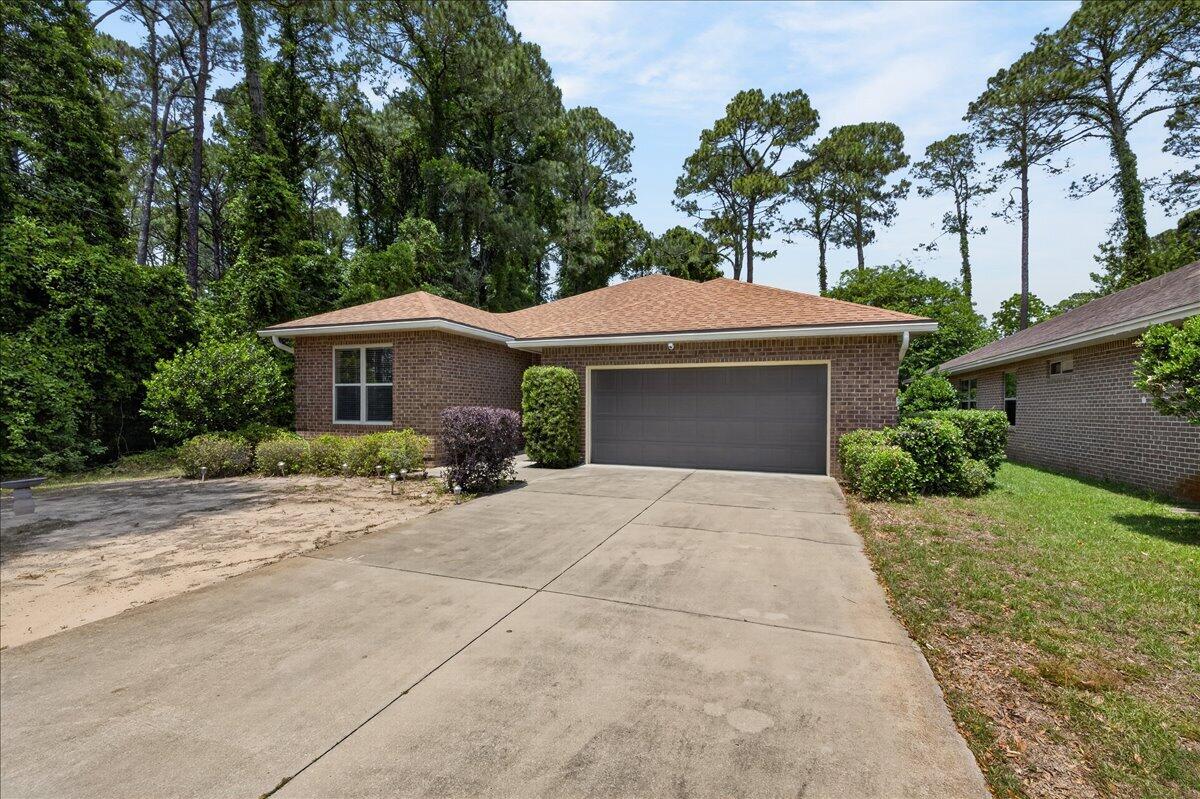 Welcome to this 2013-built gem in the heart of Niceville. This home features an open split floor plan, soaring high ceilings, and easy-care tile in the main living areas. Spacious primary suite and walk-in closet. Two car garage and plenty of parking for your boat. Step outside to a covered patio complete with a  hot tub--your private backyard retreat.