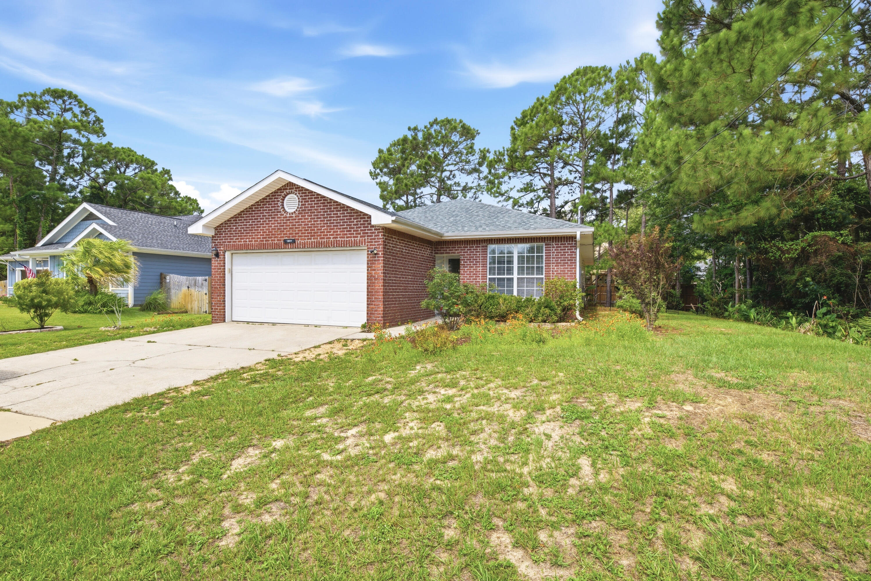 BACK ON MARKET AFTER MAJOR REMODEL! !!! Take a Look at this Great Priced 3/2 home in Gulf Breeze. The KITCHEN has been completely remodeled, including new cabinetry, hardware, granite countertops, and brand new appliances! Also, check out the beautifully updated Master Bathroom, including a modern double vanity with stylish mirrors, lighting and hardware. This home Features trey ceilings in the living room and master bedroom with recessed lighting and ceiling fans. Property has been updated with wood-look plank tile throughout the kitchen, master bedroom and master bathroom, as well as new carpet throughout the living room and remaining bedrooms. This home is conveniently located to nearby schools and just minutes away from the Woodlawn Beach Boat Ramp. Brand NEW ROOF in January 2026 completes this wonderful home. MOVE IN READY and no RENTAL Restrictions