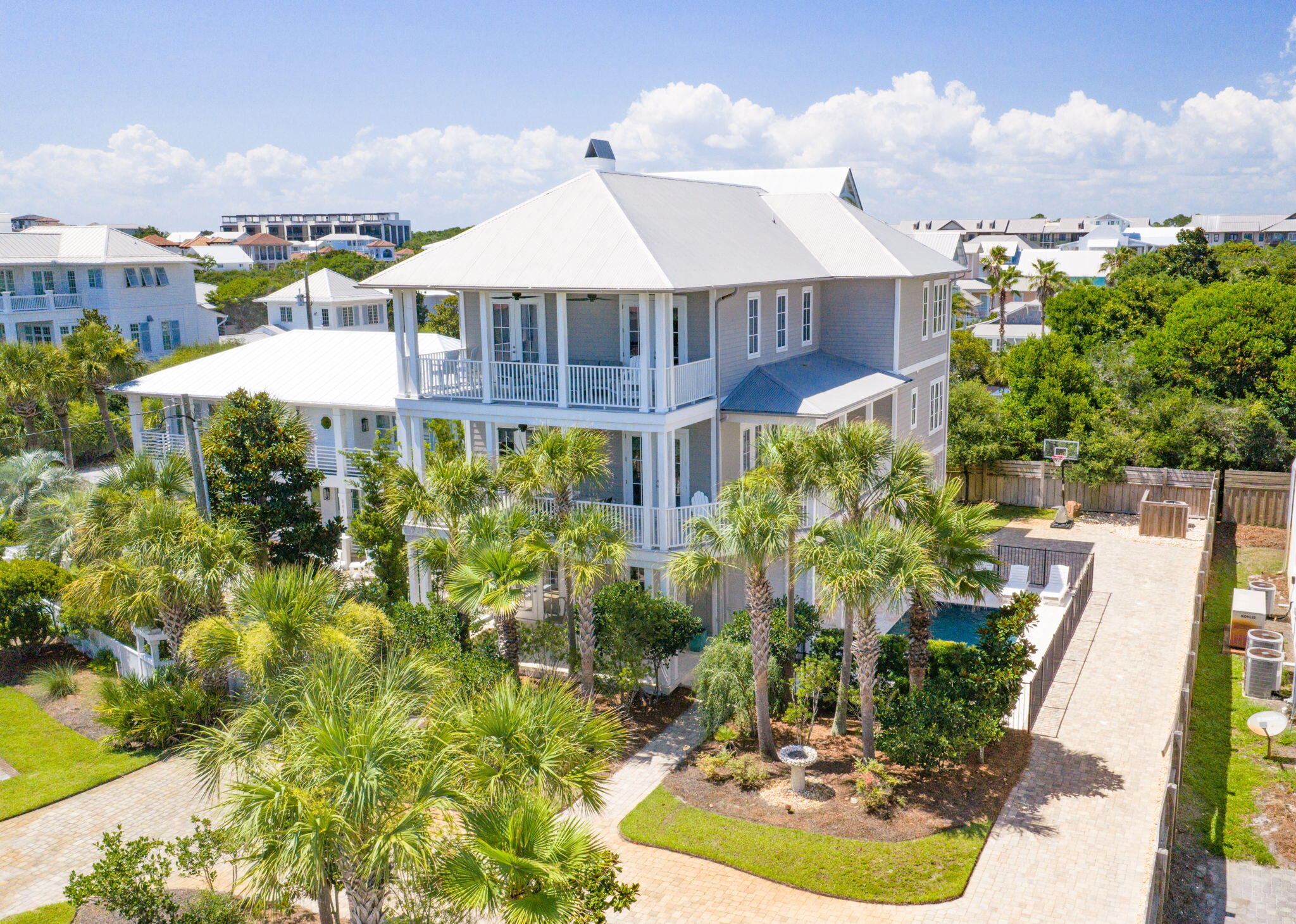 Luxury Living with PRIME location in Blue Mountain Beach. Ideally positioned south of Scenic Highway 30A directly across the street from the Gulf of America.  This exceptional Gulf-view beach home places you just 75 steps from the sugar-white sand and emerald waters that make the Emerald Coast one of the country's most sought-after destinations.
Whether you're searching for an extraordinary second home or a rental investment property, this property checks all of the boxes. Offering 6 spacious bedrooms, 6 full bathrooms, 1 half bath, three separate living areas, and an elevator providing convenient access to every level, the home was thoughtfully designed to accommodate large gatherings while offering privacy and comfort throughout.  What's more is there is ample parking to accommodate all of your guests.  There is an oversized 1.5 car garage and a driveway that easily handles 7+ vehicles.  
The first floor welcomes guests with a spacious family room featuring soaring 10-foot pecky cypress ceilings, and three sets of French doors that open directly onto the private pool deck, creating a seamless indoor-outdoor entertaining experience. Upstairs, the main living area is where this home truly shines. Framed by breathtaking panoramic Gulf views, the open-concept living, dining, and kitchen spaces are designed for gathering after unforgettable days at the beach. Shiplap accents, rich oak flooring, and abundant natural light create an elegant coastal aesthetic, while the chef's kitchen features floor-to-ceiling custom cabinetry, marble countertops, stainless steel appliances, an induction range, wine refrigerator, ice maker, and generous seating for family and friends. Multiple balconies invite you to enjoy spectacular sunsets and refreshing gulf breezes throughout the day.
Outside, the heated private pool and expansive sun deck provide the perfect place to unwind while the integrated SONOS sound system sets the soundtrack for your coastal getaway.
This home is ideally situated in Blue Mountain Beach, one of the most desirable and consistently sought-after rental markets along Scenic Highway 30A. You are sure to appreciate the coastal charm and incredible walkability that Blue Mountain Beach affords. Spend your mornings grabbing coffee or a famous scoop from Blue Mountain Creamery, enjoy fresh coastal flavors at Red Fish Taco, gather with friends for authentic Italian at Mimmo's 30A, or take a short bike ride to nearby Grayton Beach and Seaside for boutique shopping, live music, and award-winning dining.
Properties offering this combination of Gulf views, beach proximity, generous accommodations, and an unbeatable Blue Mountain Beach location are increasingly difficult to find. This is more than a beach house--it's an opportunity to own one of 30A's premier coastal retreats while enjoying exceptional rental potential in one of the area's most beloved destinations.