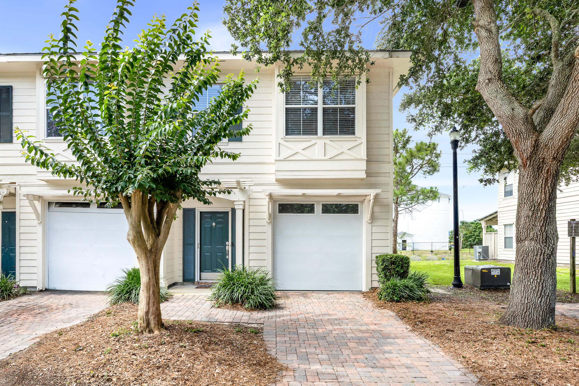 Freshly painted inside and out, this beautiful and spacious end-unit townhome offers the perfect combination of comfort, style, and privacy. Bright, inviting interiors create a light and airy feel throughout, while the desirable end-unit location provides additional windows and natural light. Enjoy a more private setting with a rear-facing lot that offers a peaceful backdrop instead of directly overlooking neighboring back porches. Whether you're relaxing indoors or enjoying the outdoor space, this home delivers a sense of openness and tranquility that's hard to find. Conveniently located and move-in ready, this is an opportunity you won't want to miss.