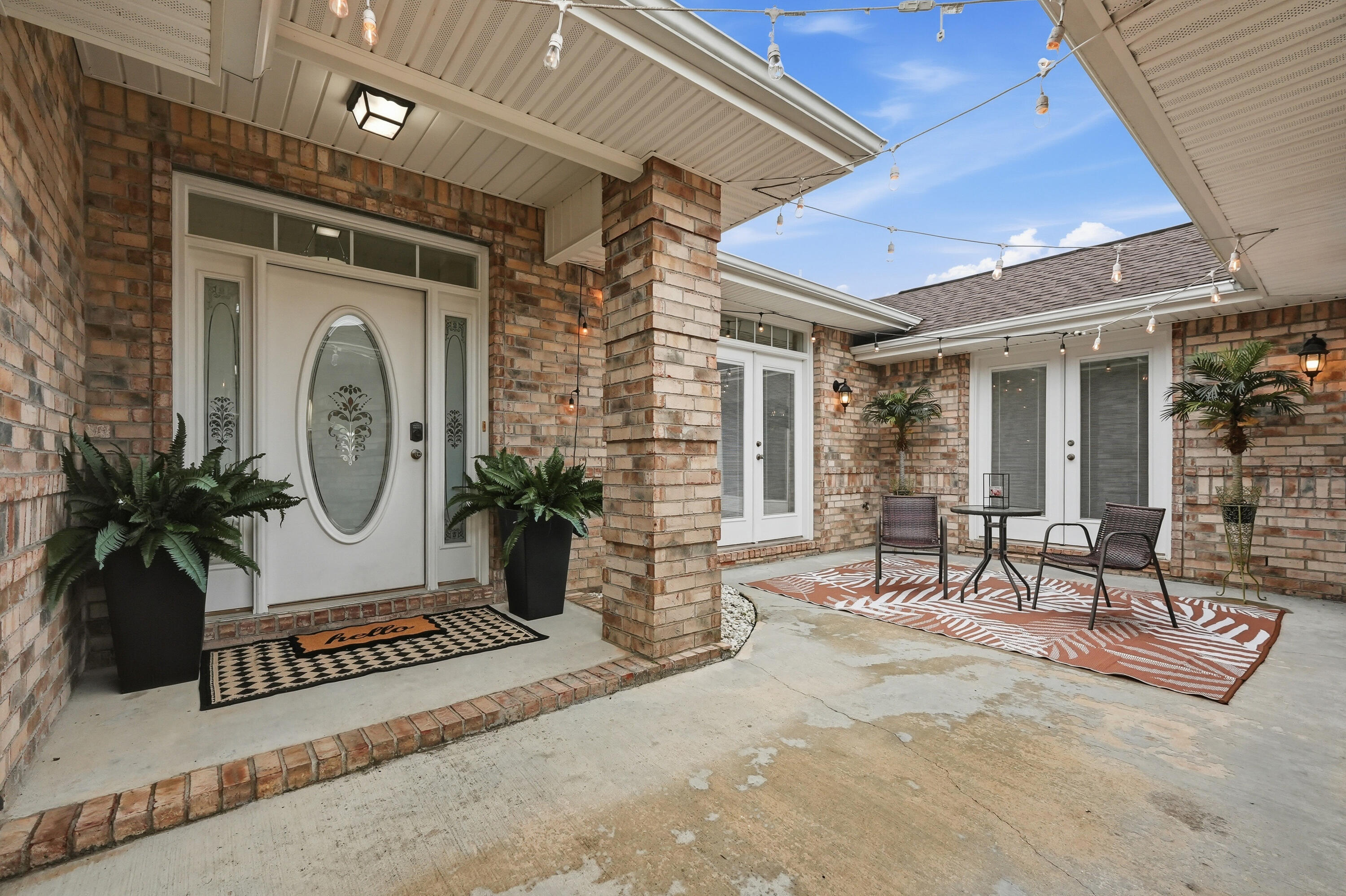 Ideally located with quick access to the new bypass, this home offers the perfect blend of convenience and accessibility. South-end shopping, dining, and everyday amenities are just five minutes away, while the brand-new, state-of-the-art Pineview School K-8 campus is approximately two minutes from your doorstep. Unlike most homes in the area, this property boasts a thoughtfully designed gated entry and private courtyard. Step through the wrought iron gate and follow the walkway to the front door, while just to the right lies a charming courtyard retreat. Two sets of French doors connect the interior living spaces to the courtyard, filling the home with natural light and creating an inviting indoor-outdoor flow ideal for both everyday living and entertaining. Adding to this home's uniqueness is a highly desirable private guest suite--perfect for multi-generational living, extended guests, or an in-law retreat. Complete with its own private entrance, living area, bedroom, and full bath, this separate space offers comfort and flexibility rarely found in today's market. Inside, the living room showcases soaring vaulted ceilings and a cozy fireplace, creating a warm and inviting gathering space. The well-appointed kitchen is designed for both function and style, featuring ample countertop space, a center island prep area, stainless steel appliances, a breakfast bar, walk-in pantry, and an adjacent breakfast room. Retreat to the spacious primary suite featuring two walk-in closets and a well-appointed ensuite bath with double vanities, a relaxing garden tub, and a separate shower. Additional features include two HVAC systems--one dedicated to the guest suite and one servicing the main home--providing comfort and efficiency throughout. Step outside to enjoy the large backyard with an irrigation system and plenty of room for outdoor entertaining, recreation, and play. Major updates include a 2023 roof, 2021 Lennox HVAC system, and 2018 water heater.