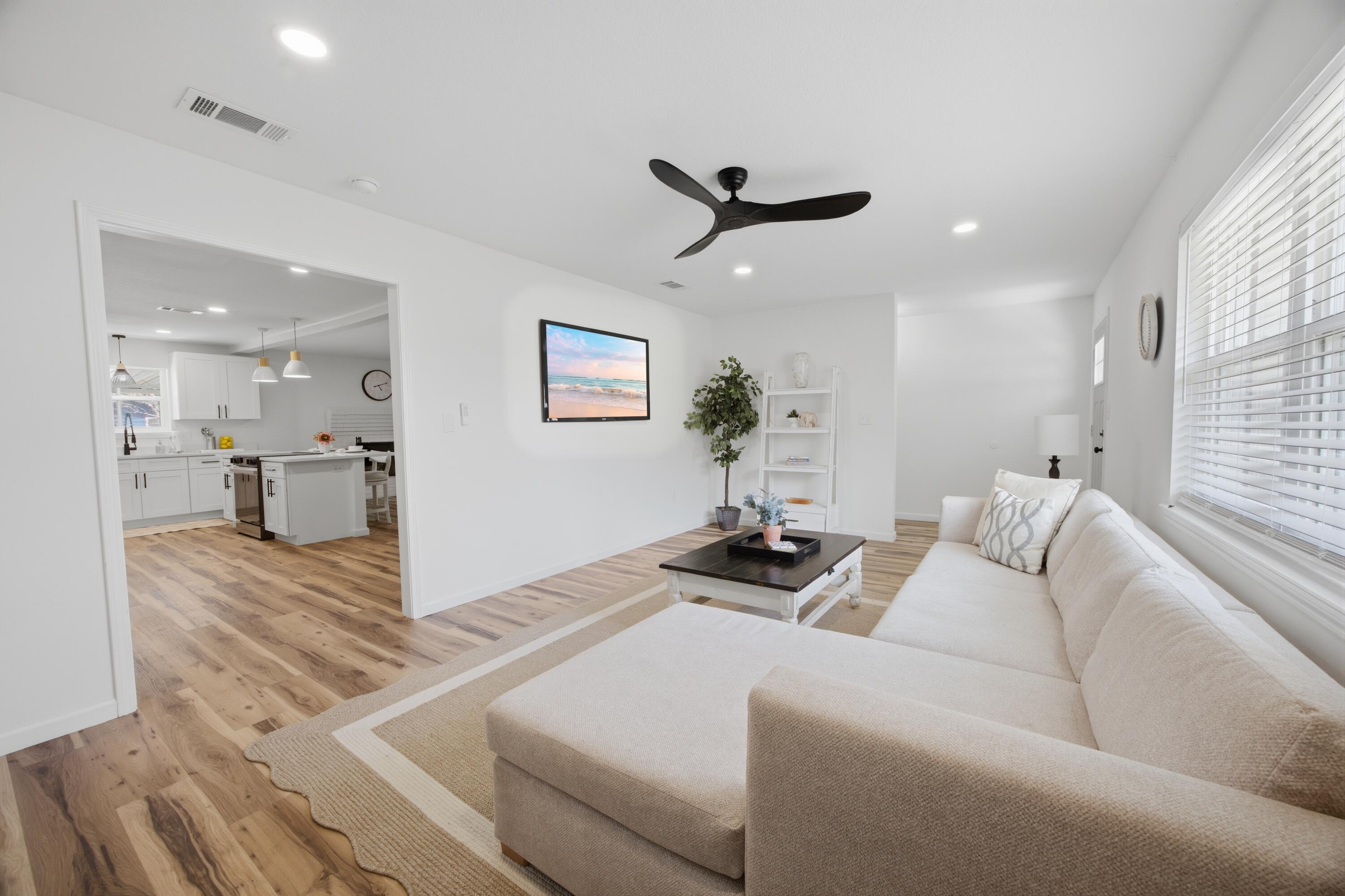 Discover modern comfort at 600 Burgundy Lane in Fort Walton Beach, where thoughtful updates and stylish finishes come together on a spacious corner lot. Inside, the home features a neutral designer color palette, luxury LVP flooring throughout, and an open-concept layout ideal for both relaxing and entertaining.

The updated kitchen serves as the heart of the home with quartz countertops, stainless steel appliances, designer lighting fixtures, and seamless flow into the living and dining areas. The living room is highlighted by a charming wood-burning fireplace, creating a warm focal point for the space.
Stylish upgrades continue throughout the home with updated bathrooms featuring tile finishes, wood vanities, and modern fixtures. Decorative, upgraded lighting add character, while new int erior paint and updated doors provide a fresh, polished look. The home also offers abundant storage with multiple closets throughout.

Step outside to enjoy the covered back porch, perfect for relaxing or hosting gatherings, along with a large powered storage shed that adds functionality and extra storage space.

Conveniently located just minutes from shopping and dining along Beal Parkway, this home is approximately 10 minutes from the white-sand beaches of Okaloosa Island and offers an easy commute to both Eglin Air Force Base and Hurlburt Field. Combining thoughtful upgrades, modern style, and a prime location, this property offers the ideal blend of comfort and convenience along the Emerald Coast.