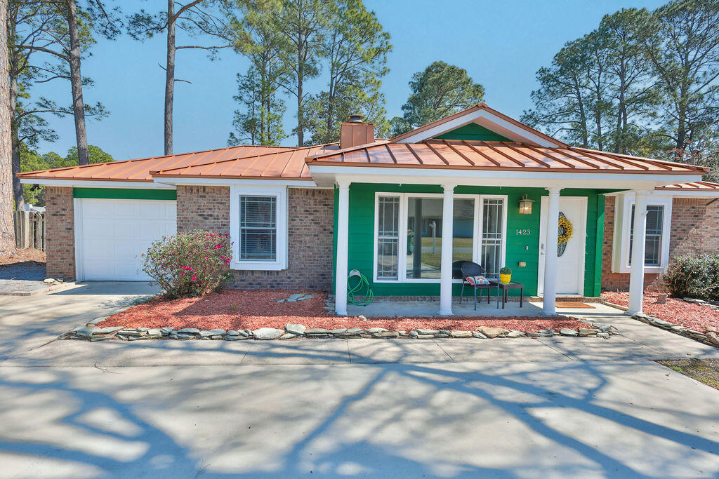 Welcome home to this refreshed 3BR/2BA gem nestled between both Hurlburt & Eglin AFB, short drive to shopping, worship centers, restaurants, & the beach! Inside boasts a bright, inviting interior recently paint & a layout that lives comfortably perfect for a starter home or a home to retire in. Peace of mind comes w/a durable metal roof while the kitchen shines w/a gas stove, perfect for the home chef. Out back, unwind in your private hot tub, sit on the paver patio,  & enjoy the extra space everyone wants: an air-conditioned bonus building ideal for a home office, game room, gym, studio, or the ultimate ''she-shed.'' Situated on a generous lot this property offers a great blend of function, flexibility, & ready for you to move in and entertain your friends & family for all those BBQ'S. There is even plenty of space for all your guest to park with the oversized parking pad out front. Home has so many updates you won't want to miss. New lights & fans, & a beautiful tile shower, and the washer and dryer stay too. Don't miss this opportunity to snag this one!