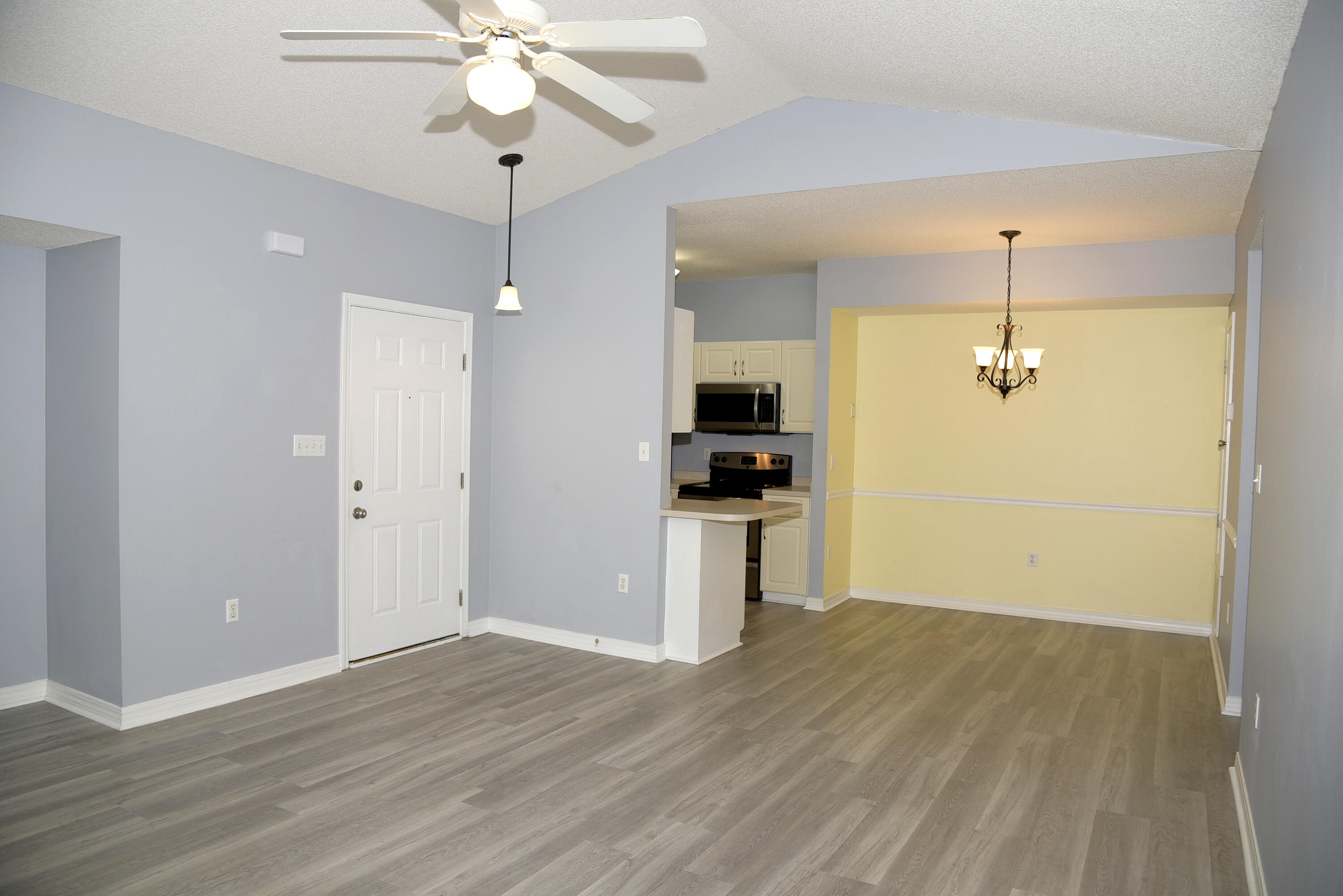 This updated 2nd floor 2 bedroom, 2 bathroom unit in the Oaks boasts a modern feel with stainless steel appliances and stylish lvp and tile flooring throughout. This unit features an open floor plan with cathedral ceilings in living room, bay window and laundry closet with a stacked washer and dryer. The community pool is perfect for relaxing on those warm Florida days and the shady gazebos and BBQ areas for outdoor fun. Enjoy all the area has to offer including shopping and the beautiful beaches of the Emerald Coast from this centrally located unit. Don't miss out on this fantastic opportunity to call this your new home!