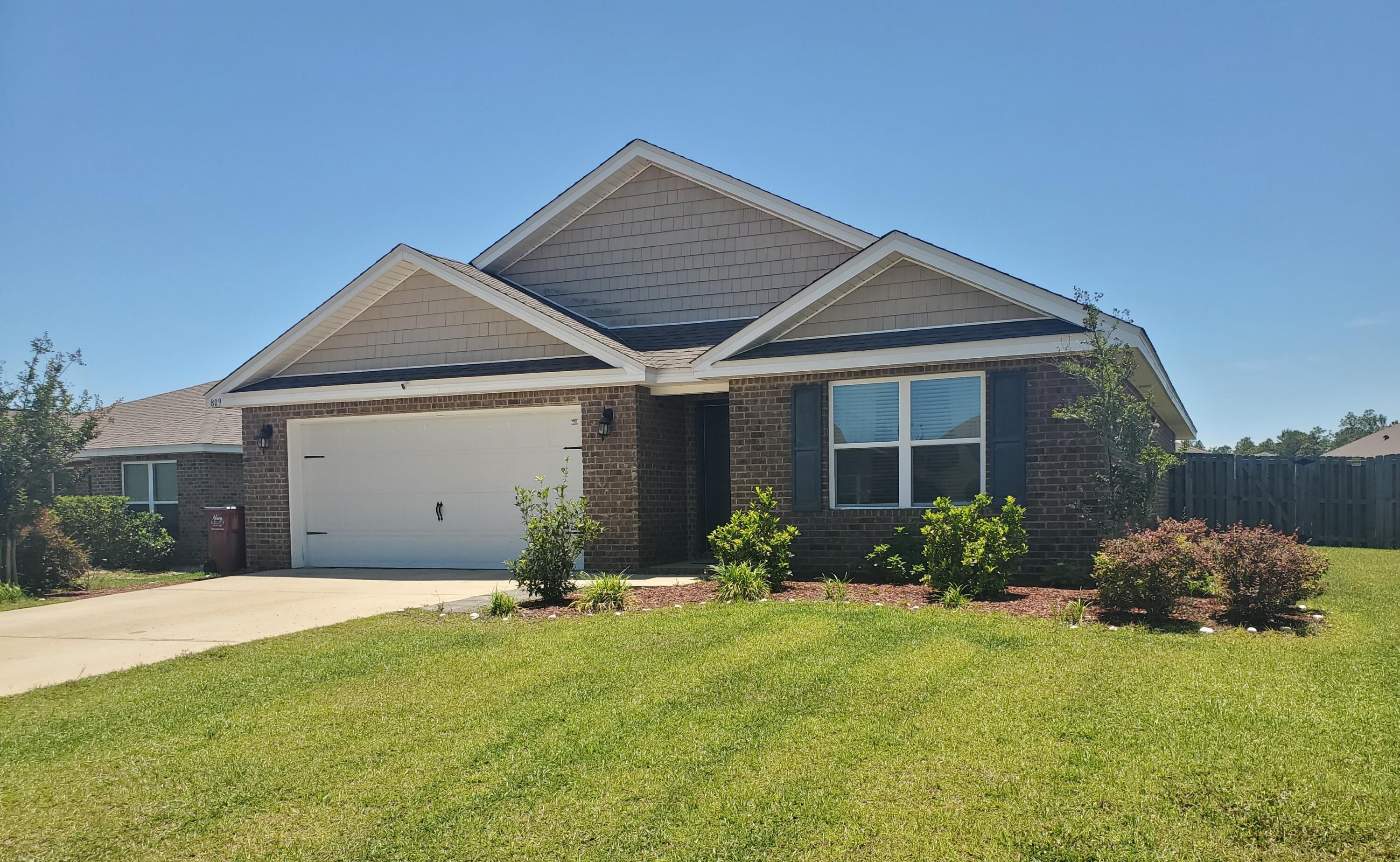 Brand new carpet in bedrooms first week of June! 4/2 Cali floor plan located in Redstone Commons, featuring durable LVP flooring, granite throughout, and spacious open floor plan. Freshly painted front and back doors offer enhanced curb appeal. Foyer opens into lovely kitchen with large center island, stainless steel appliances (newer refrigerator), and walk-in pantry. Kitchen overlooks living and dining areas for a spacious open-concept design.
  
The primary suite offers a spacious layout with double vanity and generous closet space. A true split floor plan provides privacy and separates the primary from three additional bedrooms, which are nicely sized to accommodate guests, office, or hobbies. 

Step outside to a covered back patio overlooking a privacy-fenced backyard, ideal for outdoor entertaining. Garage has a custom-installed flaked epoxy floor. 

Redstone Commons' numerous amenities include pool, clubhouse, picnic area, playground, dog park, and upscale pavilion with outdoor kitchen and seating, creating a perfect setting for recreation, gathering and daily enjoyment. The community has underground utilities and is conveniently located near shopping, dining, medical facilities, and local bases. Quick move in possible.