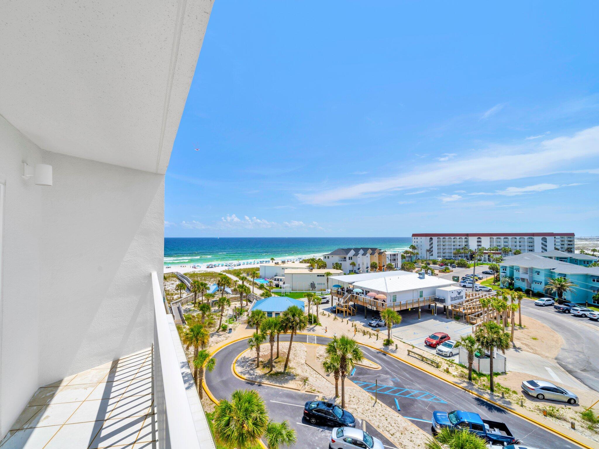 Do not miss your chance to own a gorgeous condo with Gulf views on the TOP floor (7th) at Seacrest Condos! This condo offers an unparalleled location with no one living above you and the best views in the building, coupled with balcony access from the master bedroom and living room. In 2022, Seacrest Condos went through a major exterior renovation which included all new windows, sliding glass doors, balcony flooring, exterior paint, and more. As of November 2024, a new roof was put on the building which is something a new buyer will not have to worry about for a long time! Unit 707 is a turnkey investment you and your family will enjoy for years to come. Enjoy the laid back life at this complex which has a sparkling INDOOR/OUTDOOR swimming pool, ample parking, BBQ's, tennis courts, basket