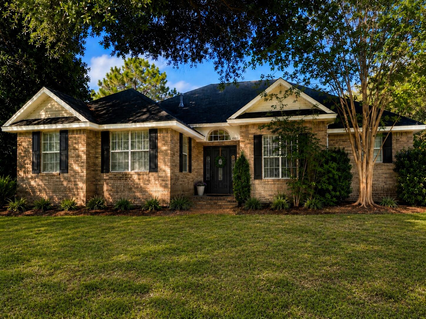 Great location to the extreme south end of Crestview, convenient to military bases, hospital, and shopping.  Lovely, all brick home with an open floor plan in the Shoal River Country Club.Fresh New vinyl plank flooring, tall ceilings.. Enter into the tiled Foyer that opens to the Living Room, complete with gas log fireplace, French doors open to the patio and private, fenced backyard.. The home has a formal dining area as well as a breakfast area between the kitchen and den.  A half bath is conveniently located just off the foyer. Bay windowed Family Room, with a built-in desk, adjoins the Breakfast Nook, LOTS of cabinets!  Master Bedroom Suite has a bay window, trayed ceiling, and large walk-in closet. Separate vanities.  garden tub in addition to a walk in shower.  
The other 2 bedrooms share a Jack and Jill bath with double sinks.  The garage is large and the attic above the garage offers ample space for storage.  Come and see this great home  on the tree lined street of Lovegrass Lane. The living room has a lovely natural gas fireplace and French doors that lead to a patio and private fenced backyard. 
All windows have blinds that remain with the house.
