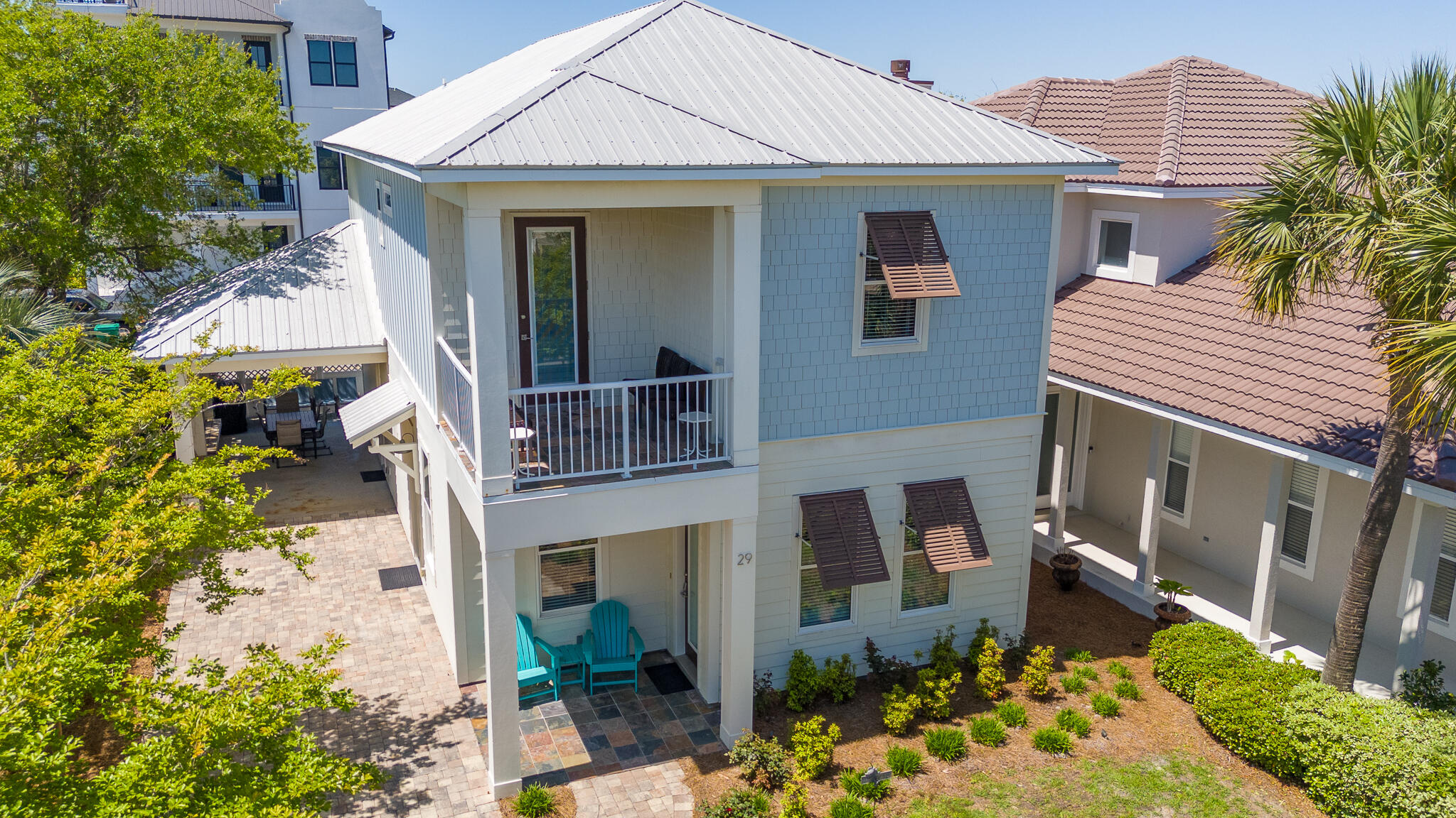 Available October 24, 2026.  5 Bedroom 4.5 baths in Gated Emerald Waters Village, just 1.5 blocks to the deeded beach access. First floor living, Kitchen, dining, powder room, Master bedroom and large laundry with full size washer/dryer and refrigerator. Second floor has a desk area, 2 master bedrooms, a guest room and a room with custom bunks with 2 Full and 2 Twins.  There is a full size stack washer and dryer on this floor as well.  Enjoy the carport area that also serves as a porch with the outdoor dining table. Included is all furnishings and the golf cart.  Master on first floor has a closet so large there is a full size crib in it.   2 Community pools.  Pompano Joes is a short walk.  Tenant pays utilities, Owner pays yard and assessments.  One year lease min.  $5500 Deposit.  Owner MAY consider a dog, depending on breed and age.  Cats are NOT allowed.