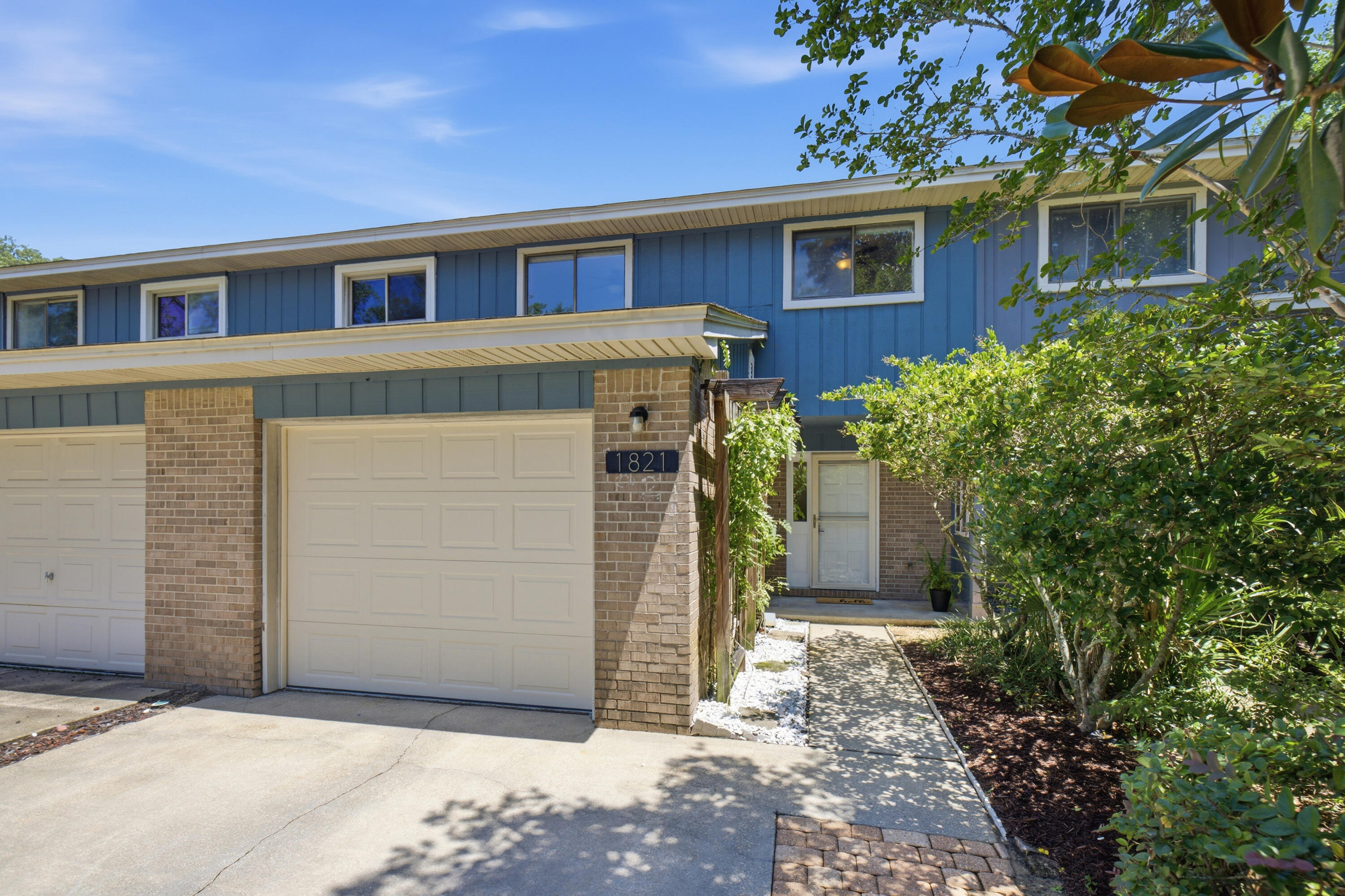 Welcome to waterfront living in the heart of Niceville! This beautifully updated 3-bedroom, 2.5-bath townhouse offers 1,317 square feet of comfortable living with modern improvements and exceptional community amenities.
Inside, you'll find a freshly updated kitchen, new interior paint, and a warm, inviting living area centered around a cozy wood-burning fireplace. Thoughtful updates continue throughout the home, including a brand-new HVAC system (2026), a new garage door, and fresh landscaping make this townhome move in ready.
The spacious floor plan provides comfortable bedrooms, ample natural light, and a layout designed for both everyday living and entertaining.
Beyond your front door, enjoy the benefits of a true waterfront community featuring a private dock with boat slips, making it easy to spend your days on the water. Whether you're boating, fishing, or simply taking in the peaceful surroundings, this community offers the Florida lifestyle you've been looking for.

Only 6 miles to Eglin Air Force Base, 1 mile to Starbucks and the shopping and dining of Niceville, and approximately 10 miles to the white sands beaches of Destin via the Mid Bay Bridge