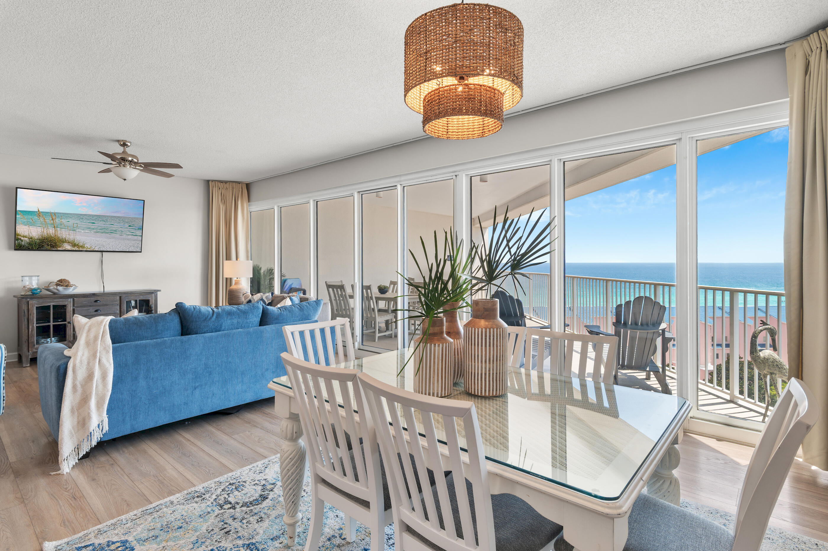 Experience breathtaking Gulf views from this beautifully appointed 8th-floor beachfront condominium in The Tides at Tops'l Beach & Racquet Resort. This bright and inviting two-bedroom, two-bath residence offers an exceptional blend of comfort, style, and resort living, with a desirable west-facing orientation that showcases spectacular sunsets over the Gulf of Mexico.  Inside, you'll find an open-concept floor plan enhanced by 9-foot ceilings and floor-to-ceiling sliding glass doors that fill the living and dining areas with abundant natural light while framing stunning water views. The spacious living area flows seamlessly into the well-equipped kitchen, creating an ideal space for entertaining or relaxing after a day on the beach.  Step onto the expansive private balcony to enjoy refreshing Gulf breezes, panoramic shoreline views, and unforgettable sunsets, perfect for morning coffee or evening cocktails. The thoughtfully designed split-bedroom floor plan offers privacy and comfort, with two spacious bedrooms, each featuring a king-sized bed and easy access to a full bathroom. A full-size washer and dryer add everyday convenience, making this residence equally suited as a second home, vacation getaway, or investment property. Residents and guests of Tops'l Beach & Racquet Resort enjoy an outstanding collection of resort-style amenities, including 600 feet of private sugar-white beachfront, multiple swimming pools, a state-of-the-art fitness center, 12 world-class Rubico tennis courts with on-site tennis professionals, racquetball courts, steam and sauna rooms, a whirlpool spa, massage services, and fitness classes. The gated community also features on-site dining, a beachfront bar, and 24-hour security, offering the ultimate coastal lifestyle in one of Miramar Beach's premier resort destinations.