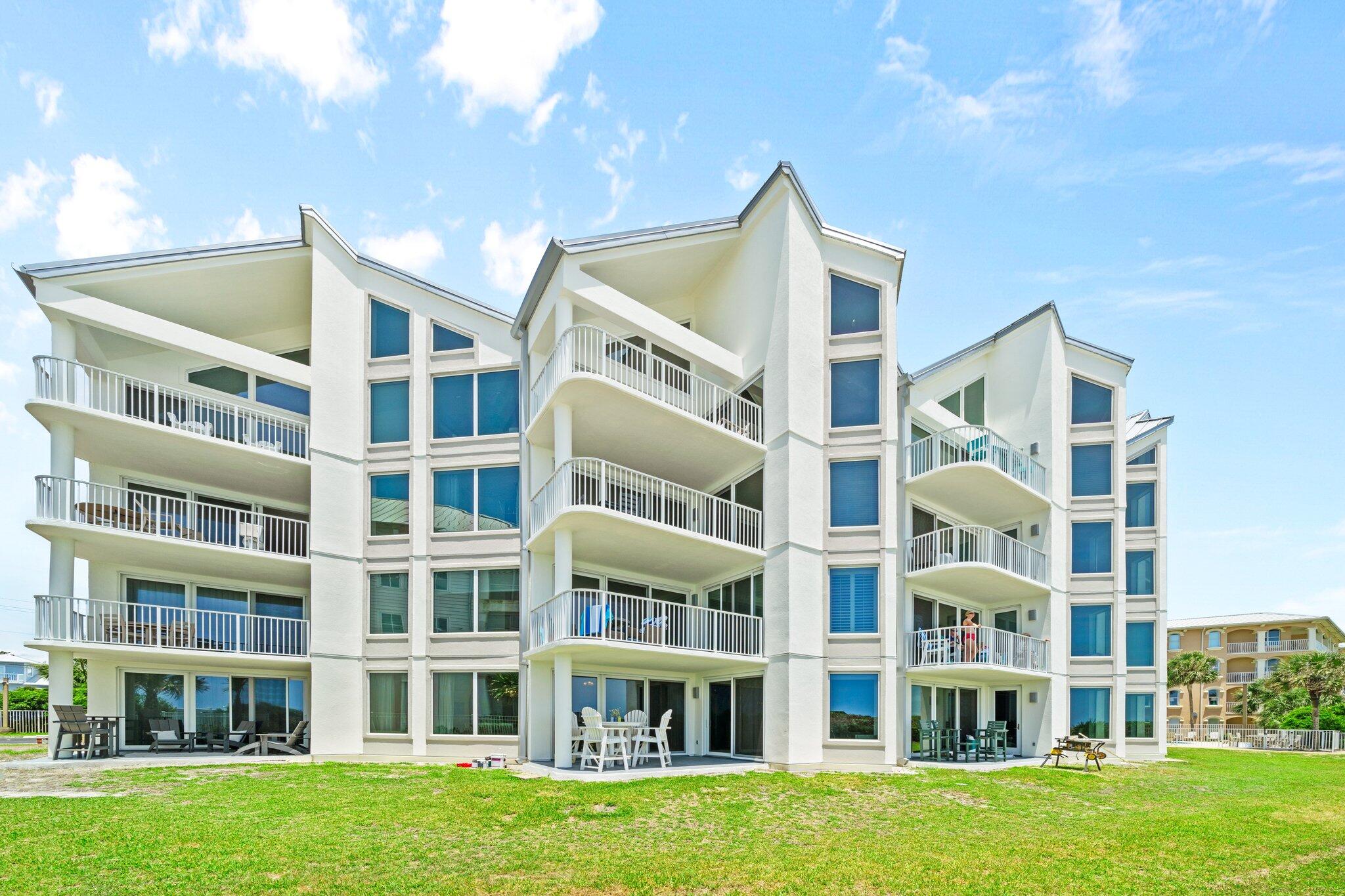 Welcome to Tranquillity on the Beach, a charming and intimate Gulf-front condominium community. This exceptional condo is ideally situated, offering stunning, unobstructed views of the Gulf with direct beach access right off your private patio — no waiting for elevators to reach the sand, pool, or parking.

Fully furnished and turn-key ready, the spacious floor plan features three bedrooms and three full bathrooms, including a Gulf-front master suite with balcony access. The gourmet kitchen is equipped with new appliances, beautiful granite countertops and a breakfast bar perfect for casual dining and gathering. The living room is bright and inviting, with large glass sliders that open to a covered balcony overlooking the meticulously landscaped grounds and the sparkling Gulf beyond