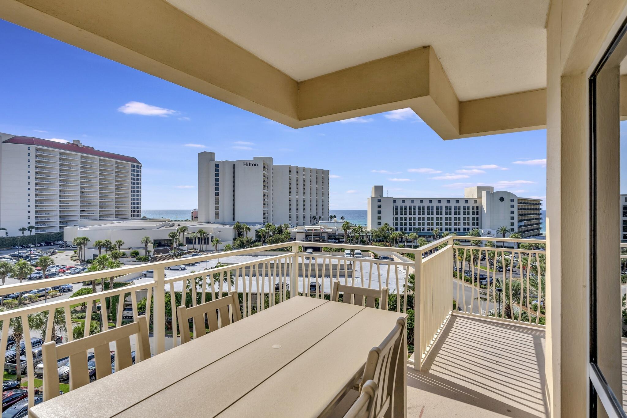 MAXIMUM RENTAL FLEXIBILITY ON THE EMERALD COAST! This beautifully elevated 4th-floor, southeast corner 2BR/2BA lock-off condo offers sweeping, unobstructed views of the Gulf of Mexico and the gorgeous coastline. Engineered perfectly for investors, the unique lock-off configuration maximizes rental income by allowing you to rent the property in three distinct formats: as a spacious 2BR/2BA suite, as a private 1BR/1BA retreat, OR as a separate, independent studio with its own private balcony. Located in Luau--Sandestin's premier resort oasis--guests will enjoy world-class amenities including a heated lagoon pool with a swim-under waterfall, walk-under grotto passageway, heated spa, first-floor fitness center, and an outdoor grilling patio. Just steps from the sugar-white sand beaches, this turnkey property is the ultimate addition to your investment portfolio or a perfect personal beach getaway!