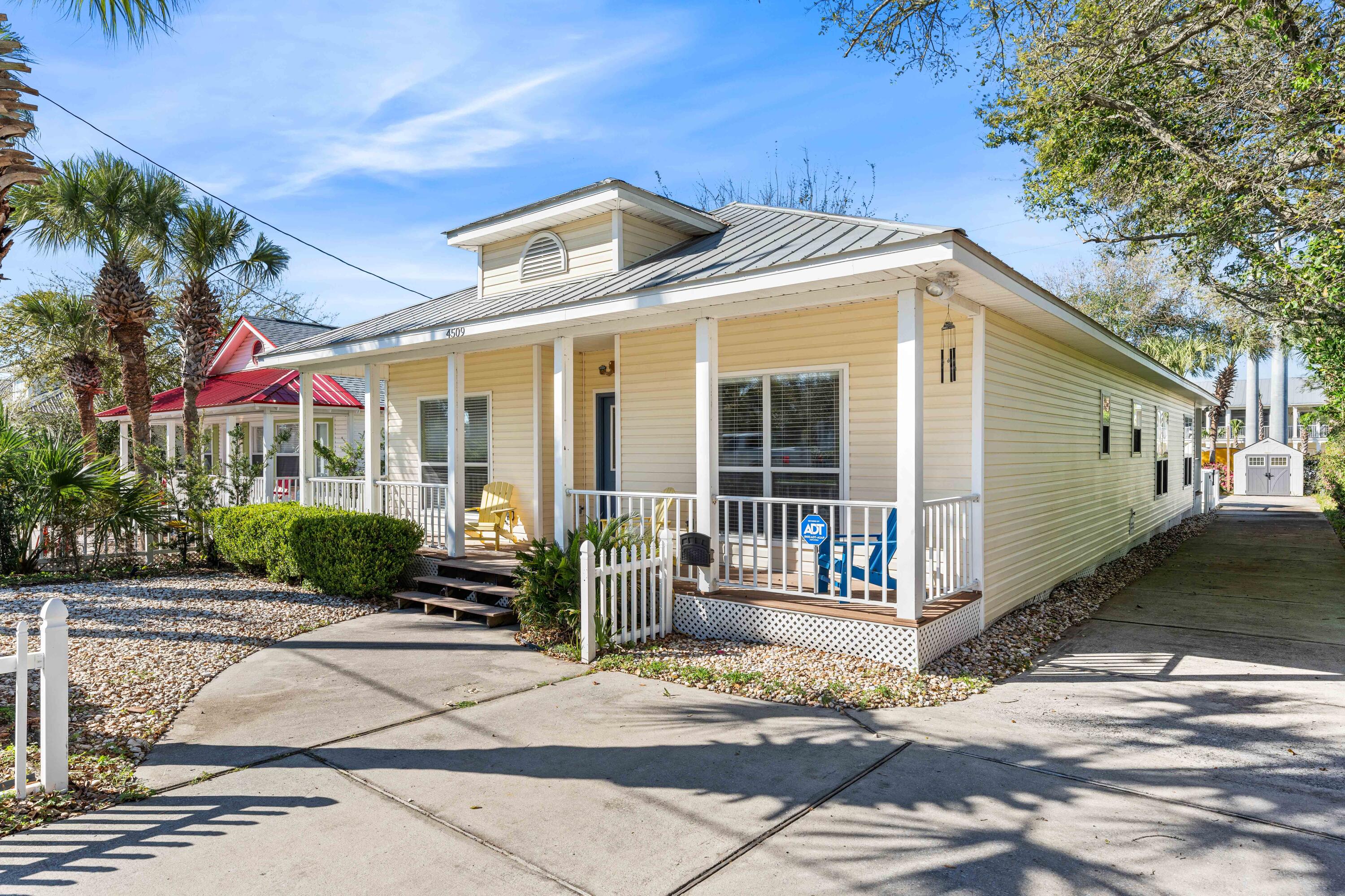 Not just a GEM on the Emerald Coast, this is the whole Treasure Chest!! 20K BELOW APPRAISED VALUE. NO HOA - PRIVATE POOL - PLENTY OF PARKING - STROLL OR GOLF CART TO MULTIPLE BEACH ACCESSES - 6 BEDROOMS- GUEST COTTAGE. With a charming coastal coziness including porches on the front and back and the color of the Florida sunshine on the outside, this property is delightfully and surprisingly spacious with 6 bedrooms, custom built-in bunk room, and private pool. The oak and palm lined driveway is ringed with azaleas and offers plenty of parking for multiple families and friends. Two master bedrooms- one in the front and one poolside that opens to the back porch, crown molding, granite countertops with plenty of bar seating, and a family friendly floorplan make the property the perfect beach getaway or strong short term rental with rental projections around 100k. An outdoor shower means no sandy toes inside while the guest house, featuring a full kitchenette and bathroom that can double as a pool bath, is a perfect place for the teenagers or grandparents to be close but have privacy. The artwork in the home even features local artists and almost all pictures are signed and numbered or artist proofs. There is also an original Judy Shillingburg mirror in the hallway.  

Located in the heart of Crystal Beach, this enchanting getaway is just a golf cart ride away from the shopping, dining, and entertainment of the Destin Commons area and the beauty and multiple beach accesses of the Scenic Gulf Drive Corridor. Come discover a gem of a beach house where a treasure trove of memories are meant to be made - whether your own or your rental guests at 4509 Luke Avenue!
