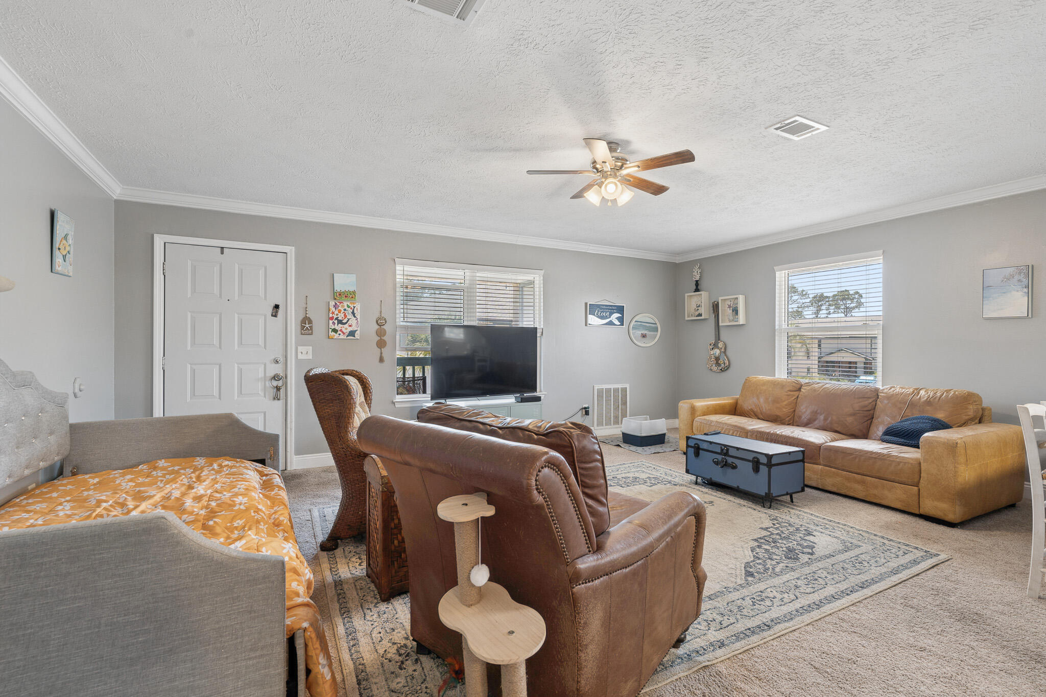 COMING SOON-NO SHOWINGS Welcome to this absolutely adorable, recently updated 2-bedroom, 1-bath condo offering 720 square feet of comfortable, easy living in one of Panama City Beach's most beloved waterfront communities. Step inside to a bright, open living area that flows effortlessly into two generously sized bedrooms, complete with the everyday convenience of an inside laundry area and a dedicated outside storage room for all your beach gear and extras. Perched on the second floor, you'll enjoy added privacy and peace and quiet with no neighbors overhead.
Tucked along the scenic Grand Lagoon--a favorite local hub for fishing, boating, paddleboarding, and kayaking--Greenwood Estates is a quiet, low-traffic complex cherished for its laid-back, tranquil setting. Community amenities include a sparkling pool, a gated dock, and a covered picnic and grilling pavilion, the perfect spot to relax, entertain, or watch the boats glide by. The location is hard to beat: you're just about five minutes from sugar-white sand beaches, plus marinas, shopping, and some of the area's best dining right on North Lagoon Drive, including The Grand Marlin, Capt. Anderson's, and the beachfront favorite Schooners.
Whether you're searching for a full-time coastal home, a relaxed seasonal retreat, or a long-term residence near the water, this move-in-ready charmer delivers character, comfort, and an unbeatable lifestyle. Please note: this is an owner-occupant and long-term community--no short-term/vacation rentals.  Homes like this in Greenwood Estates don't last long, so call today to schedule your private showing!