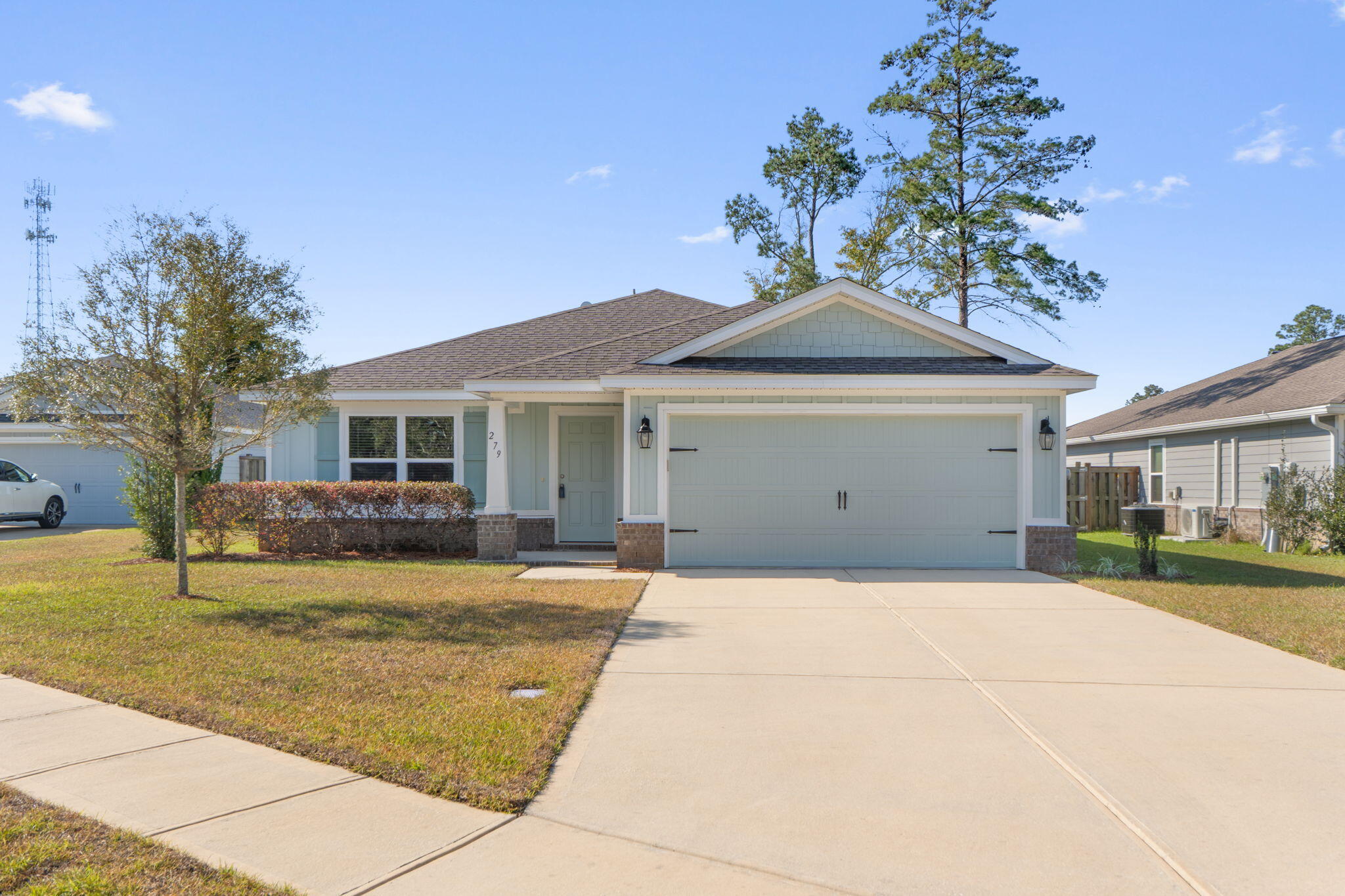 Priced to Sell Quickly! Located in the gated community of Lafayette Creek Landing in Freeport, this well-maintained 3BR/2BA home offers 1,748 sq ft on a spacious 0.2-acre lot. Bright open-concept living features a large kitchen with island, stainless appliances, and ample cabinetry, flowing into the main living and dining areas. Flexible bonus space is ideal for an office or gym. Enjoy a covered patio and fully usable backyard perfect for entertaining. One of few homes with an oversized driveway accommodating up to four cars, plus a 2-car garage. Conveniently located near the entrance for easy guest access. Community pool and clubhouse included and close to everything Freeport offers.