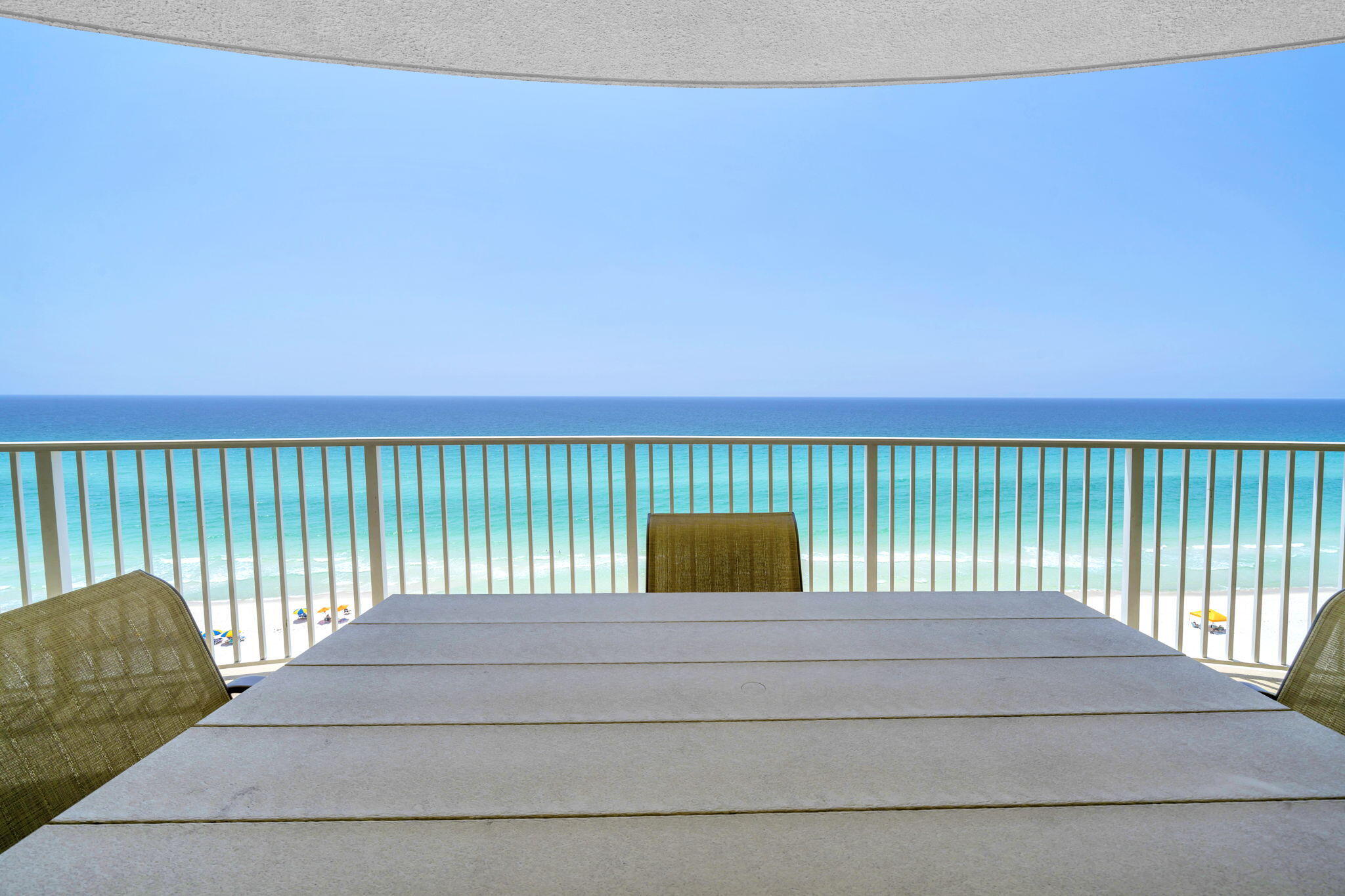 Emerald Isle 1108 is a 2-bedroom, 2-bathroom gulf-front condo in Panama City Beach with panoramic Gulf views from the kitchen, living area, and primary bedroom. Located on the 11th floor, this residence is well suited for a vacation home, full-time residence, or rental investment, with sleeping accommodations for up to 6 guests.

The open-concept kitchen, dining, and living areas create an easy gathering space for entertaining, relaxing, and taking in the Gulf views. The gulf-front primary bedroom also captures the Emerald Coast setting, while both bathrooms include spacious vanities and shower/tub combinations for everyday function.

Emerald Isle Resort amenities include indoor/outdoor pools, a hot tub, 2 saunas, a fitness room, a grilling station, beach access, dedicated beach service, ample parking, and 4 high-speed elevators. The 271 sq ft scalloped balcony provides generous private outdoor space for Gulf views and sunsets.

Located approximately 2 miles west of Pier Park, Emerald Isle 1108 offers convenient access to shopping, dining, entertainment, and recreation in Panama City Beach. A short drive west connects you to Rosemary Beach and the 30A corridor for additional coastal communities, dining, shopping, and beach access.

For buyers comparing gulf-front condos in Panama City Beach, this property combines direct Gulf frontage, wide water views, resort-style amenities, and a location near Pier Park and 30A. Rental history and future rental projections are available upon request. All dimensions to be verified by buyer.