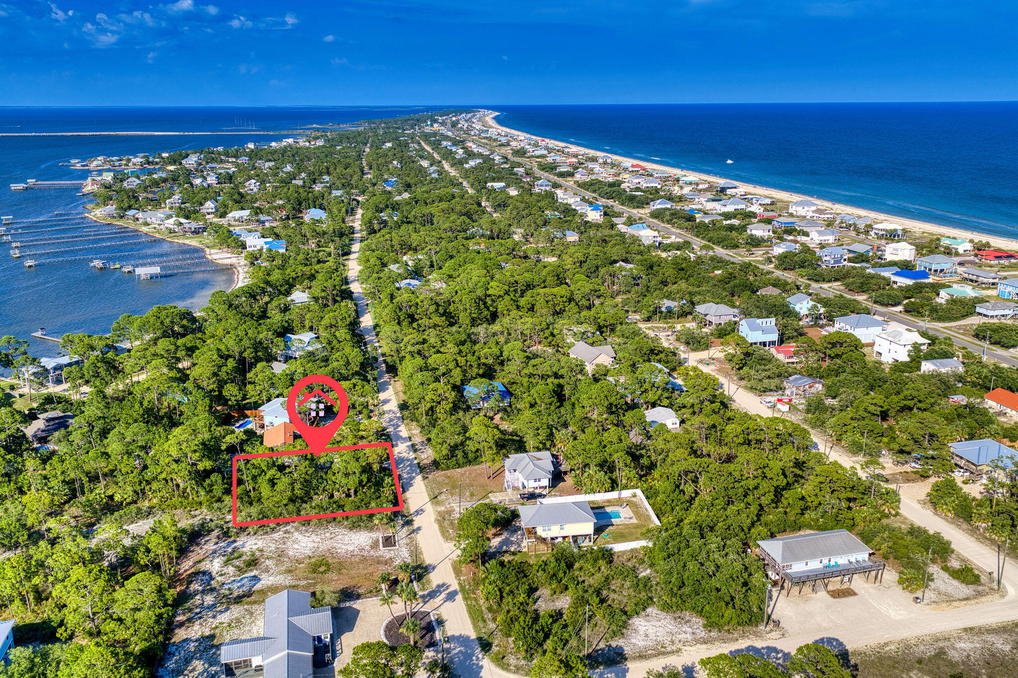 Discover the perfect canvas for your coastal dream home on this spacious 0.31-acre wooded lot located at 981 W Bayshore Drive in the heart of St. George Island! This private parcel is beautifully treed with mature pines, palms, and native vegetation, offering seclusion and natural charm while being just a short stroll from the world-class white-sand beaches of the Gulf of Mexico.
Imagine waking up to Gulf breezes and building your custom elevated residence with breathtaking beach access nearby. Enjoy endless days of swimming, shelling, fishing, kayaking, and spectacular sunsets right outside your door. This established neighborhood provides a peaceful island lifestyle on Florida's prized Forgotten Coast, with convenient proximity to state parks, marinas, fresh seafood dining, and all the relaxed charm the area is known for.
An outstanding opportunity for a primary residence, vacation getaway, or savvy investment. Bring your plans and create lasting memories in paradise. All building details, setbacks, and requirements to be verified with Franklin County Planning & Zoning.
Schedule your site visit today--this rare Gulf-side lot won't last long! Listed in Emerald Coast Association of Realtors MLS.