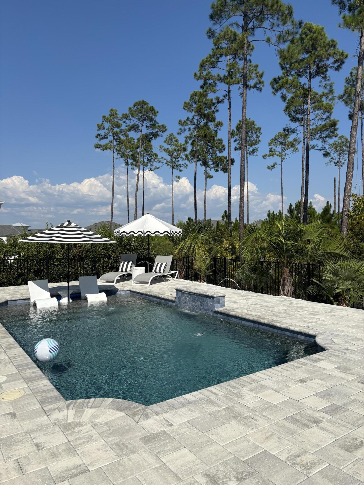 Presenting an exceptional opportunity in the highly desirable Watersound Origins community--an impeccably maintained and thoughtfully upgraded, single-story, beach-inspired home designed for effortless living and entertaining. This 2023-built residence offers three bedrooms, two bathrooms, and approximately 1,960 square feet of stylish, open-concept living space.

Step into a beautifully designed interior where refined finishes and intentional details elevate everyday living. The heart of the home features an inviting living area, chef-ready kitchen, and abundant natural light, enhanced by upgraded lighting and plantation shutters that add timeless elegance throughout.