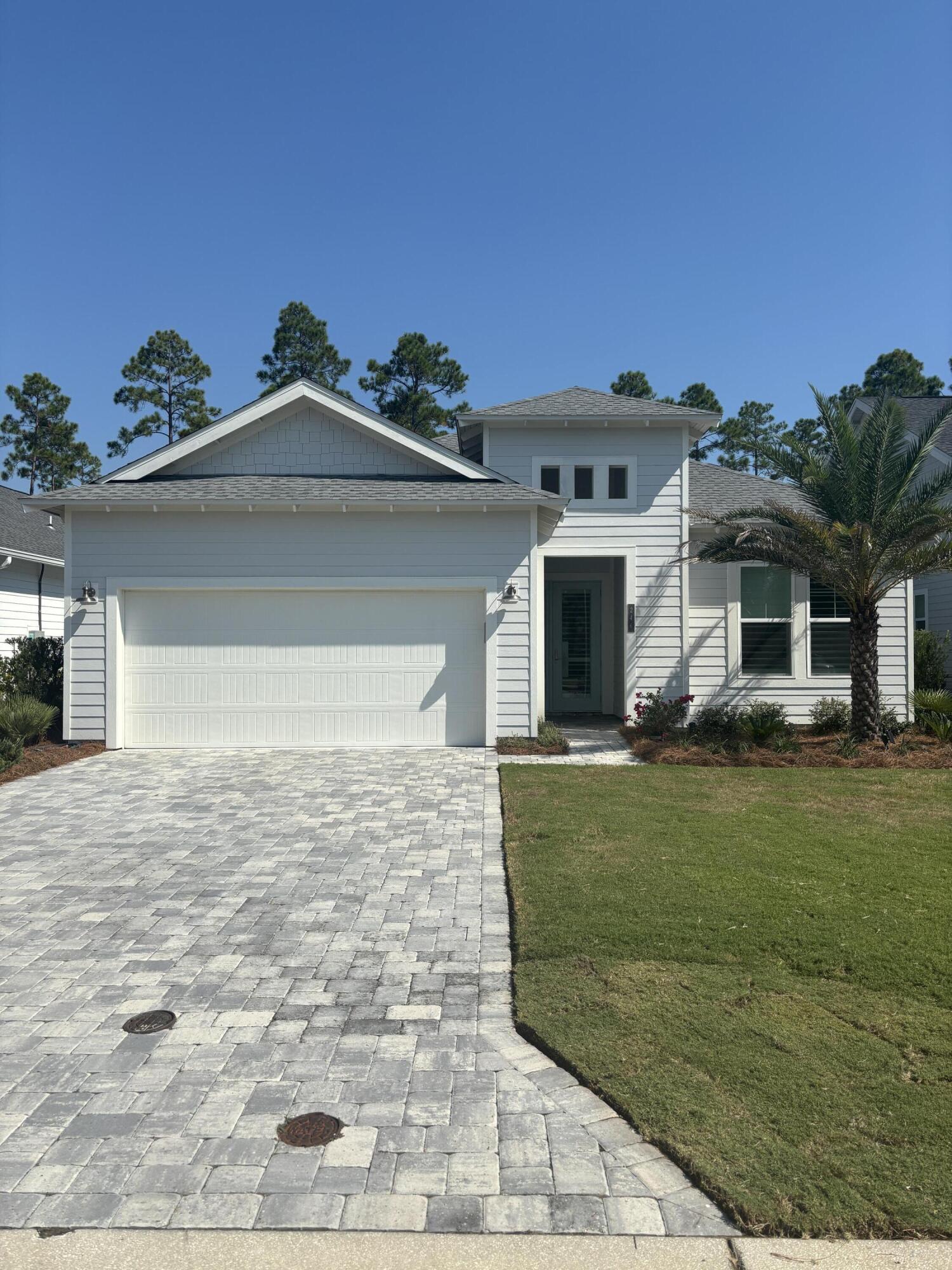 Presenting an exceptional opportunity in the highly desirable Watersound Origins community--an impeccably maintained and thoughtfully upgraded, single-story, beach-inspired home designed for effortless living and entertaining. This 2023-built residence offers three bedrooms, two bathrooms, and approximately 1,960 square feet of stylish, open-concept living space.

Step into a beautifully designed interior where refined finishes and intentional details elevate everyday living. The heart of the home features an inviting living area, chef-ready kitchen, and abundant natural light, enhanced by upgraded lighting and plantation shutters that add timeless elegance throughout.