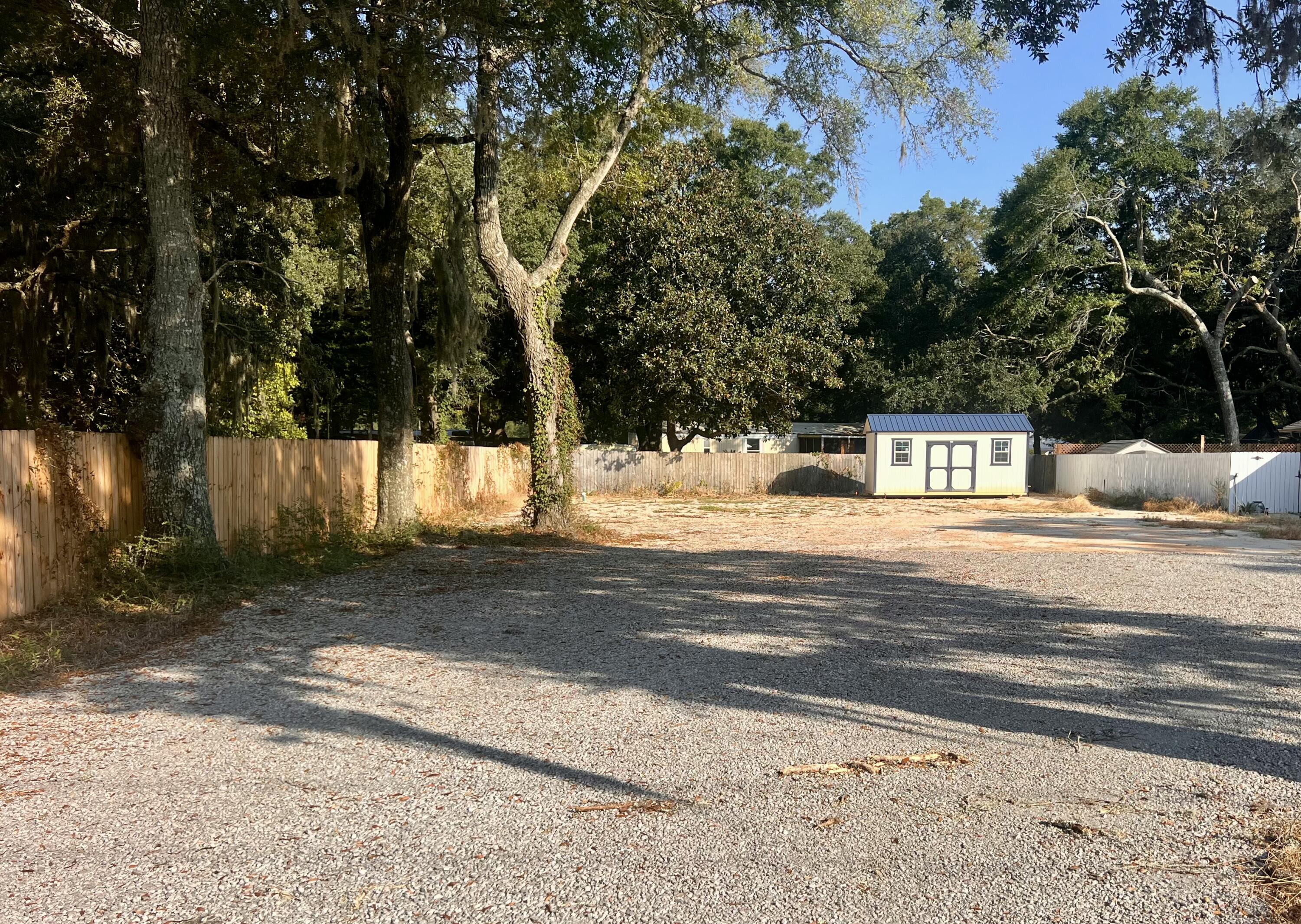 Priced to Sell! Bring offers! Enjoy stunning views of Choctawhatchee Bay from this beautiful cleared lot, perfectly prepared for your future home.  Situated directly across from a waterfront county park, the property provides unobstructed bay views and spectacular sunrise scenery.  Recent improvements include a new septic tank, leveled homesite, new shed, packed gravel driveway, and installed water meter.  Home plans are also available from the seller, making this property truly ready for construction. Come see the view that could be yours.