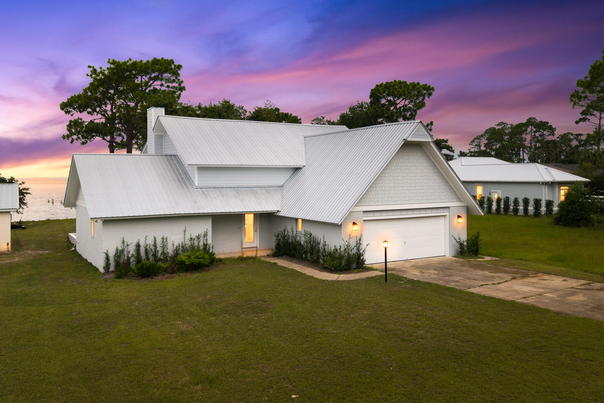 Set on the shores of Choctawhatchee Bay, this beautifully renovated 3-bedroom, 3-bath home offers the best of classic charm and modern comfort. The property showcases fresh updates throughout -including new flooring, interior and exterior paint, remodeled kitchen and bathrooms, new roof, and upgraded windows.

Inside, an inviting layout highlights spacious living areas and a cozy fireplace, perfect for any gathering. Outdoors, enjoy bayfront living with room to relax, entertain, or simply take in the serene water views. An adaptable loft enhances the home's layout, offering the opportunity to create a private guest room, serene study, or lively entertainment space. With its combination of thoughtful updates, solid construction, and prime location this home has it all.